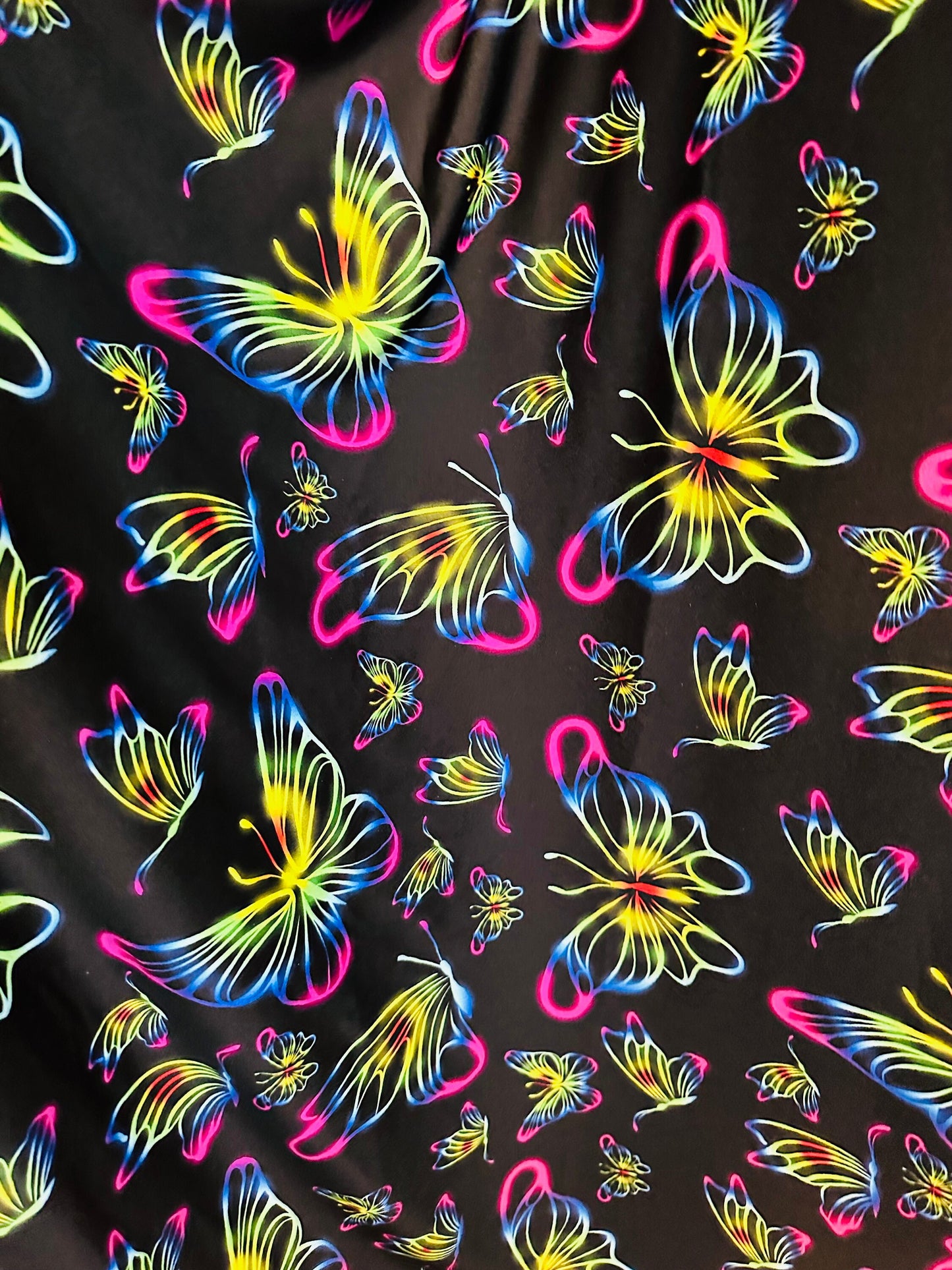 New Rainbow Butterfly design print on great quality of poly spandex 4-way stretch 58/60” Sold by the YD.