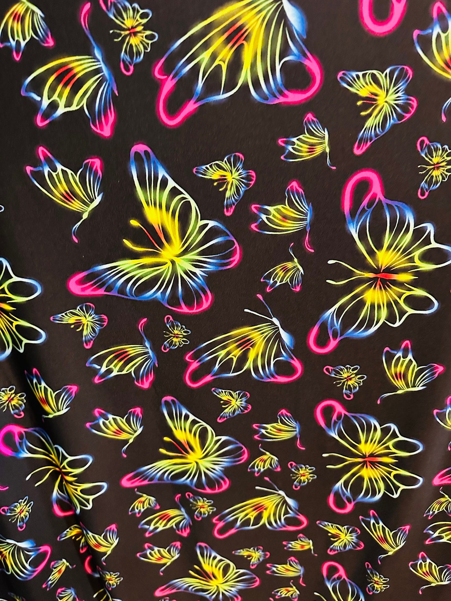 New Rainbow Butterfly design print on great quality of poly spandex 4-way stretch 58/60” Sold by the YD.