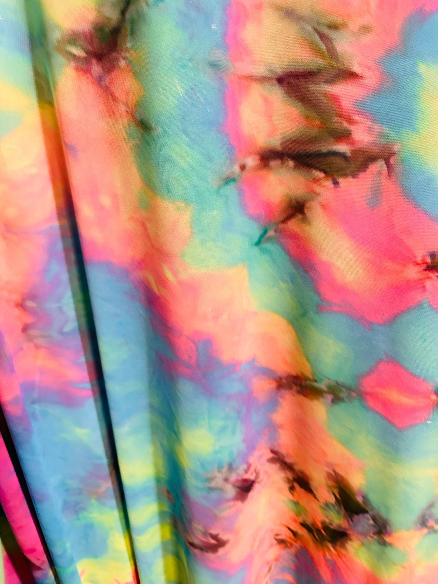 Tie dye multi pastel power mesh 4-way stretch 58/60” Sold by the YD.
