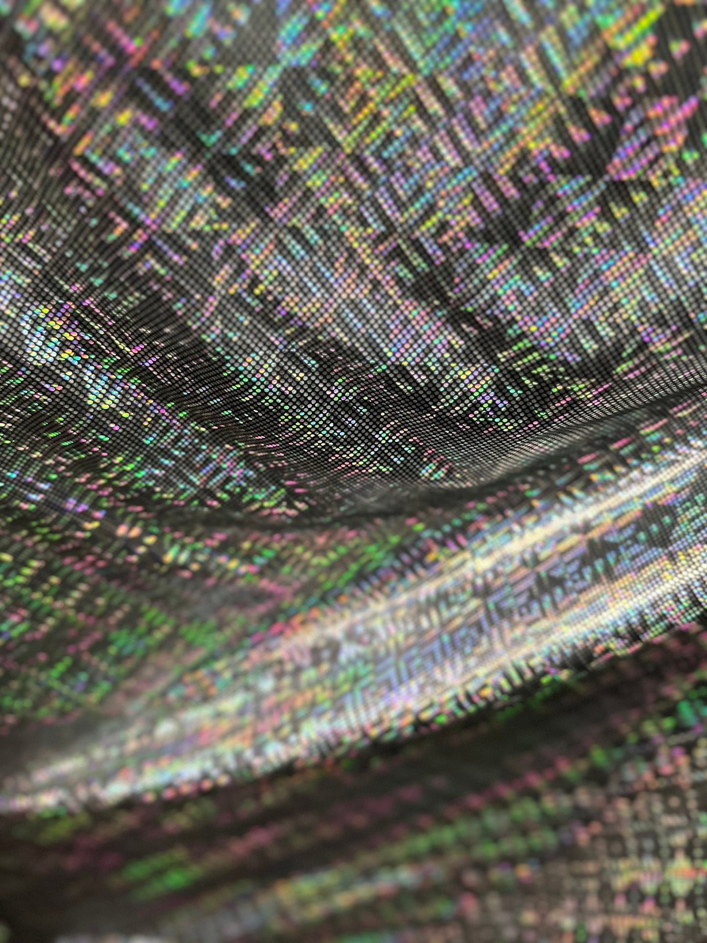 New 3D design black/silver hologram nylon spandex 4-way stretch 48/50” Sold by the YD. Ships worldwide from Los Angeles California USA.