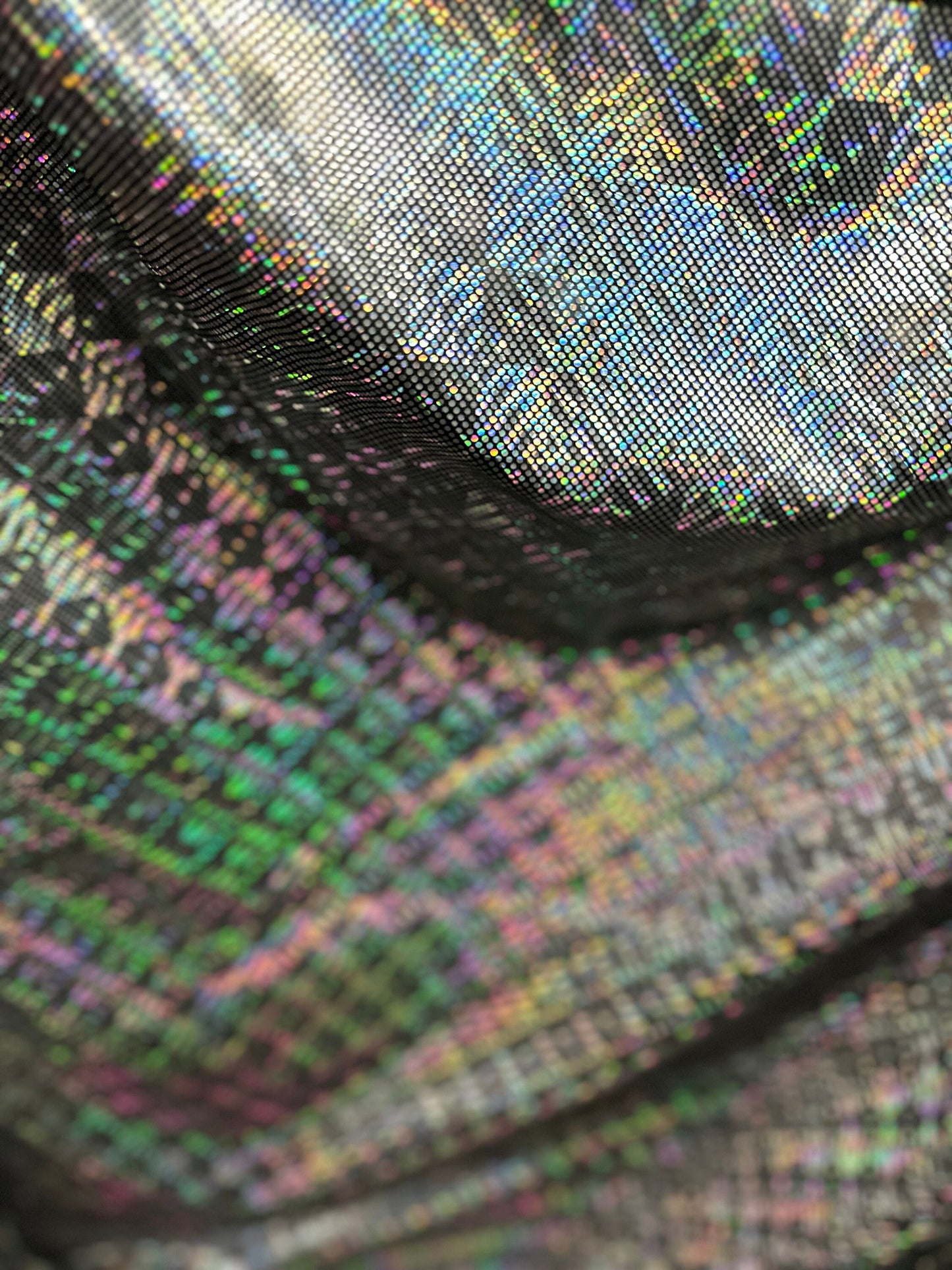 New 3D design black/silver hologram nylon spandex 4-way stretch 48/50” Sold by the YD. Ships worldwide from Los Angeles California USA.
