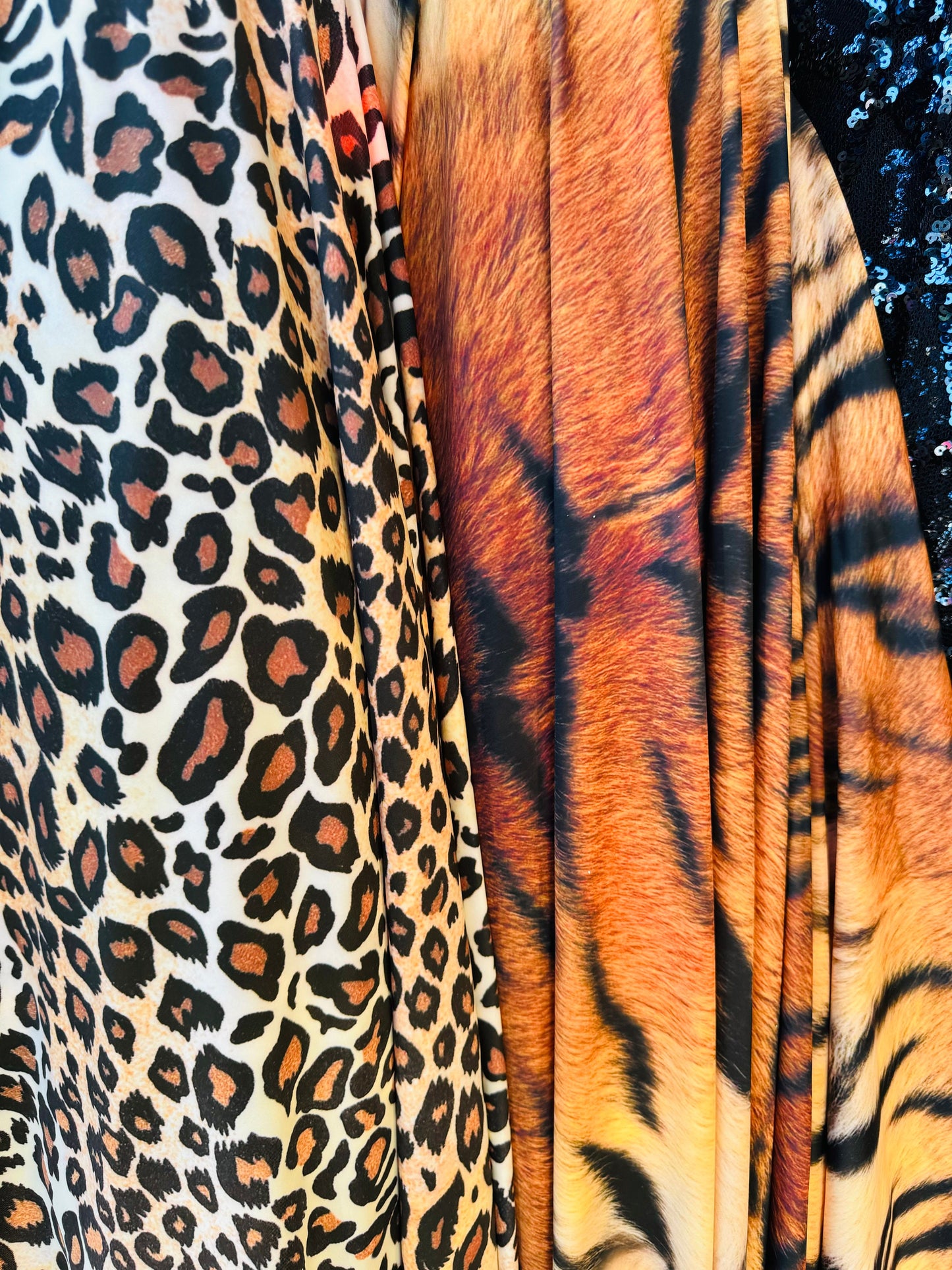 New Exotic Leopard and Tiger design print on great quality of stretch velvet 4-way stretch 58/60” Sold by the YD.