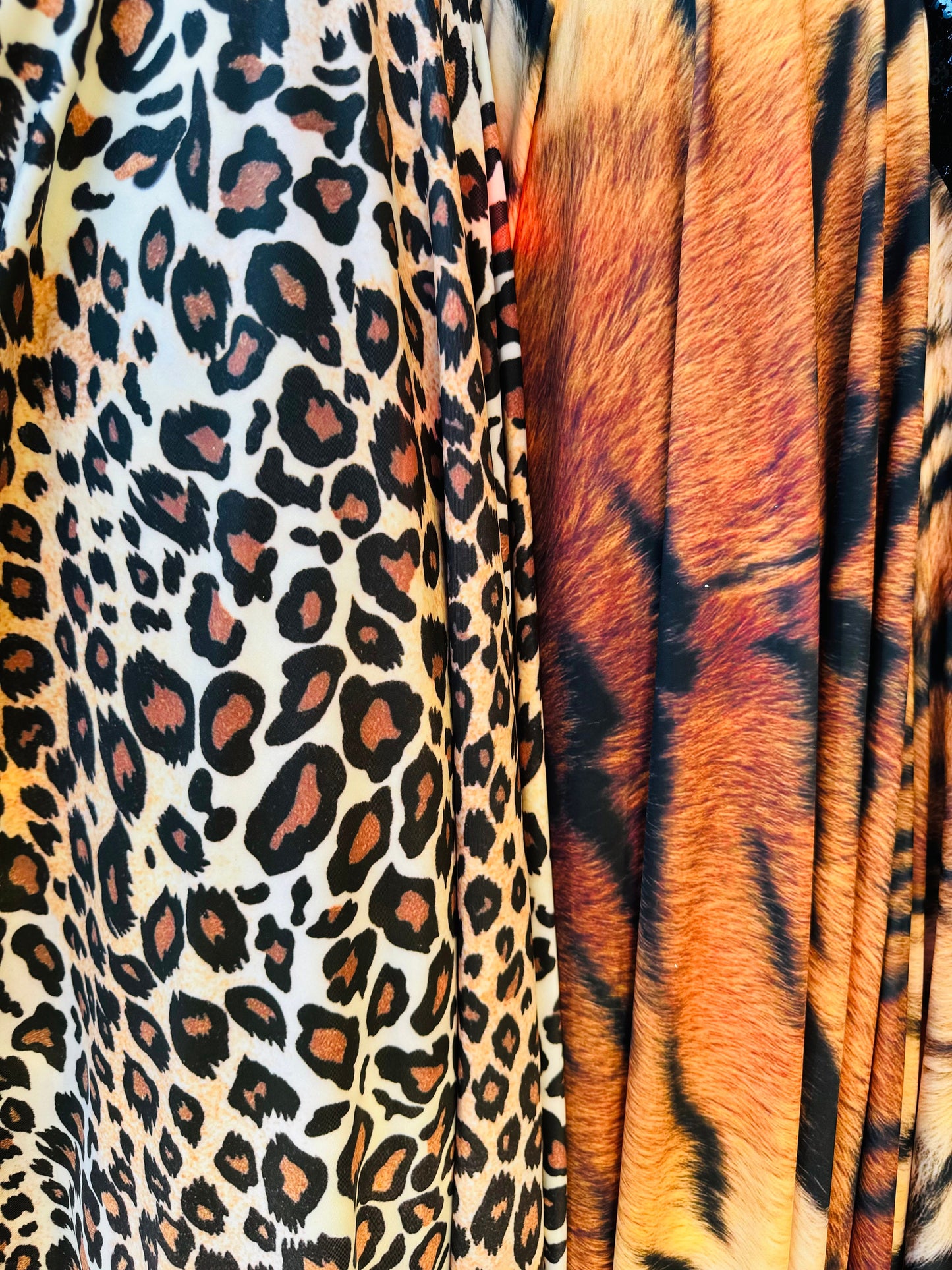 New Exotic Leopard and Tiger design print on great quality of stretch velvet 4-way stretch 58/60” Sold by the YD.