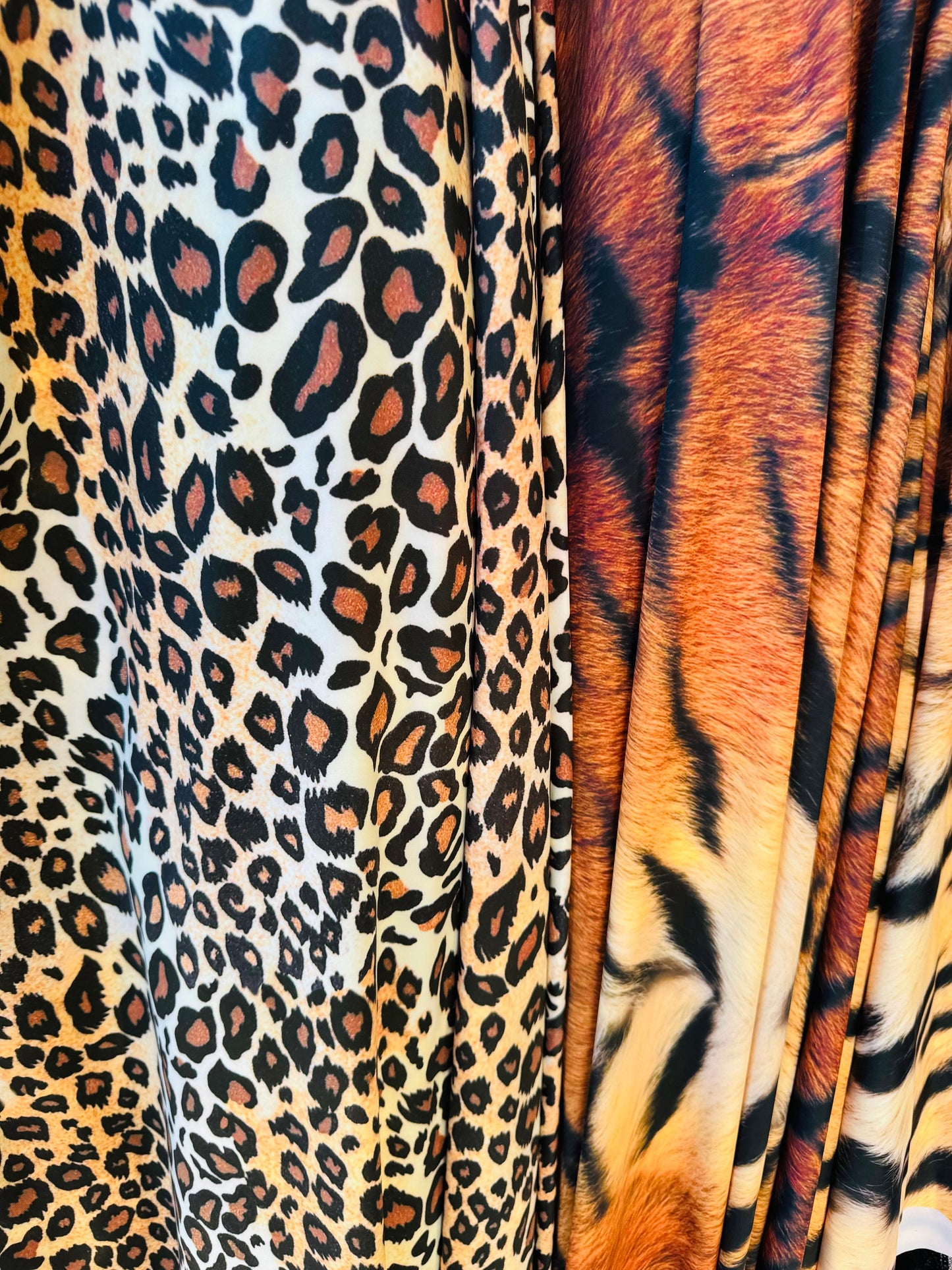 New Exotic Leopard and Tiger design print on great quality of stretch velvet 4-way stretch 58/60” Sold by the YD.