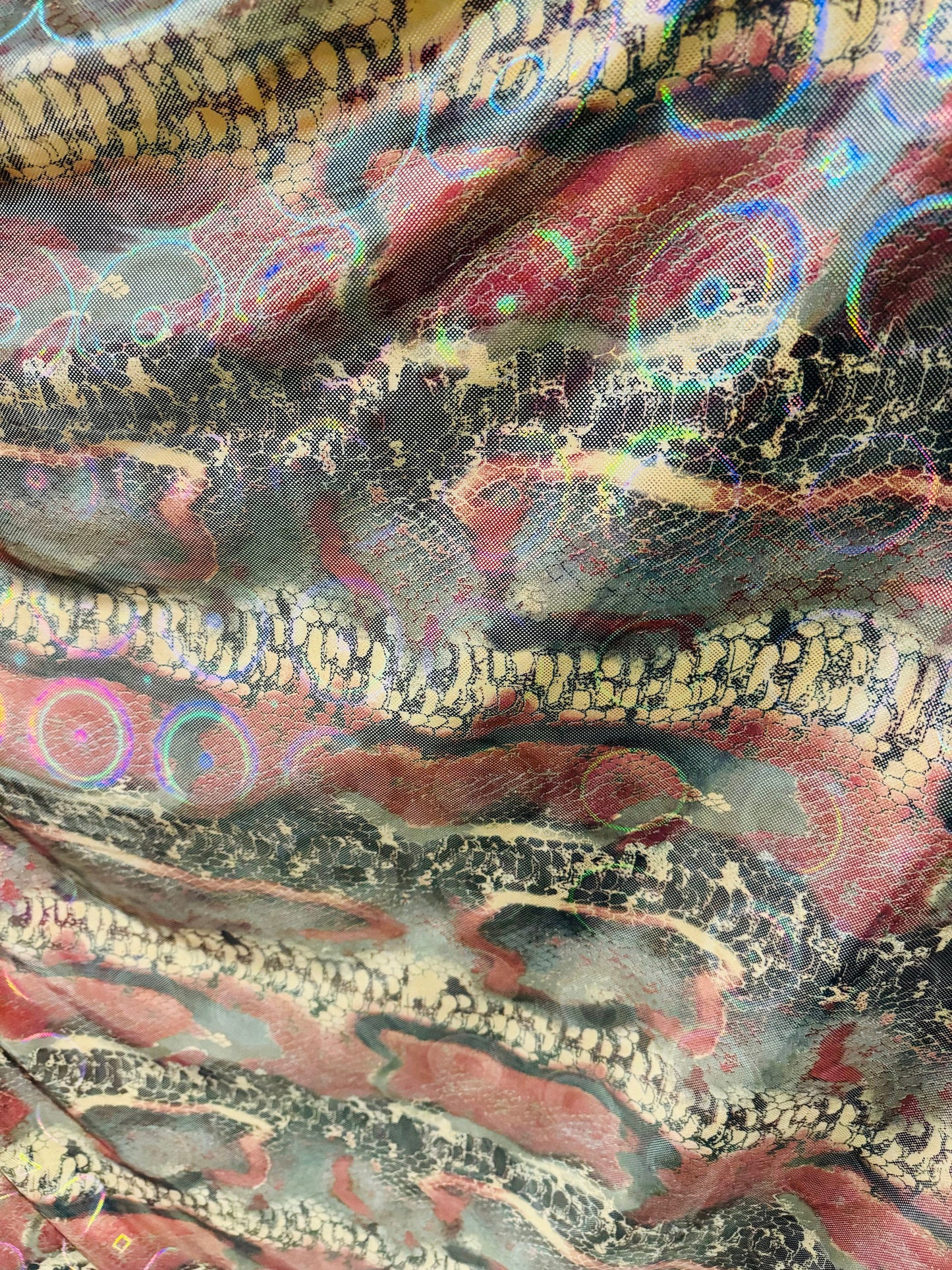 Anaconda design hologram metallic nylon spandex 4-way stretch 58/60” Sold by the YD.