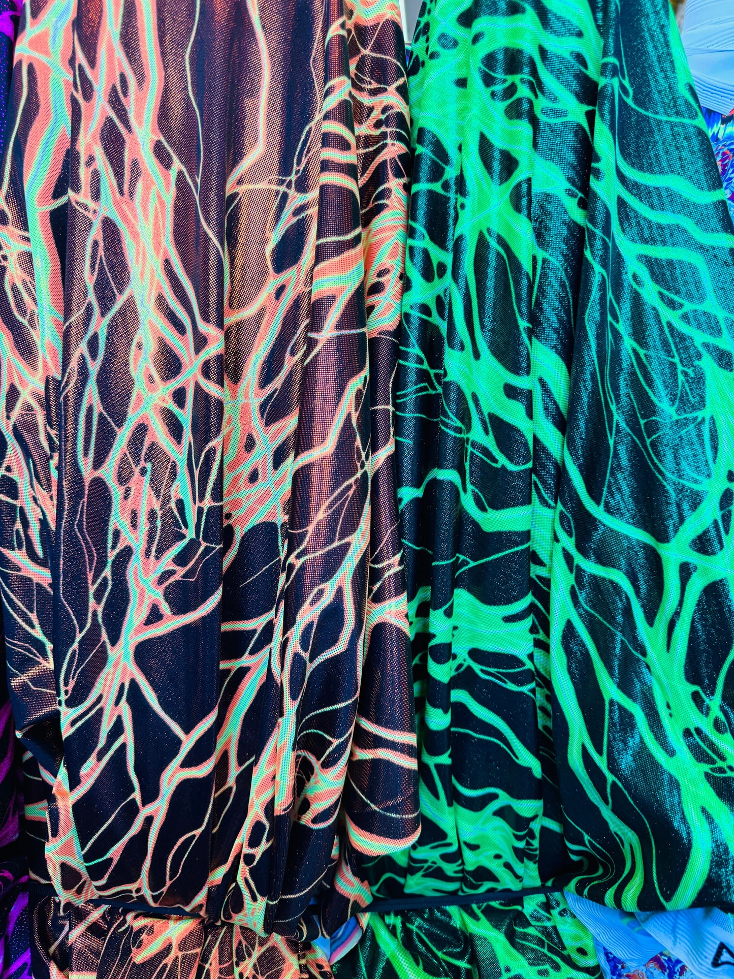 Luxury Thunder Lightning design print on great quality of nylon spandex with foil 4-way spandex 4-way stretch 58/60” Sold by the YD.