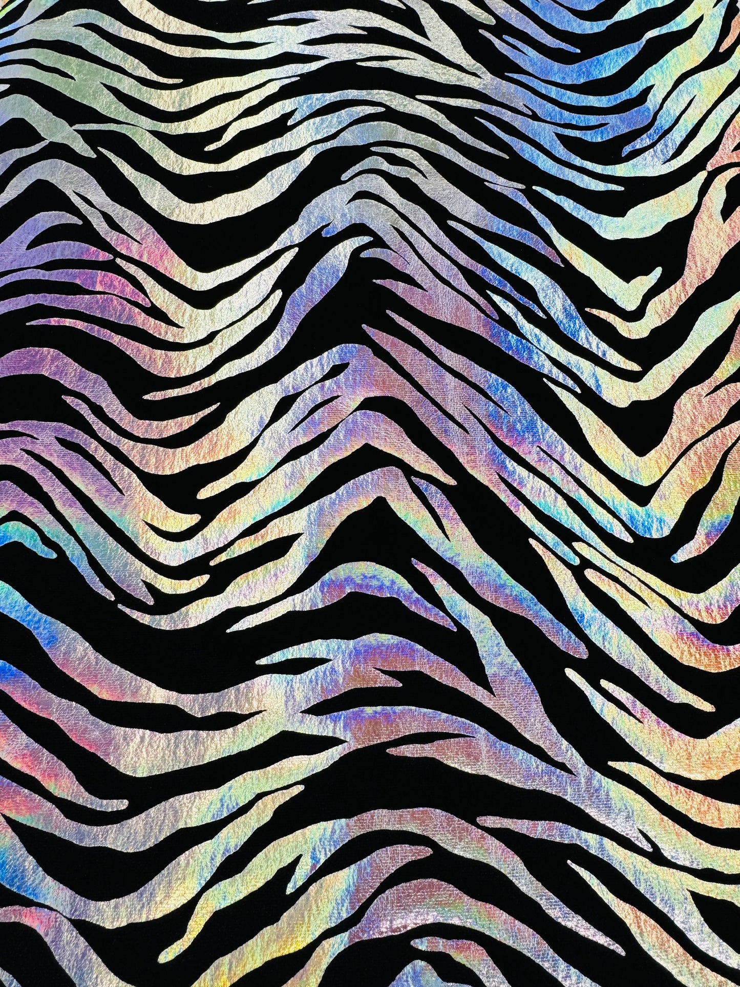 New Exotic zebra design on stretch velvet with Iridescent foil 4-way stretch 58/60”