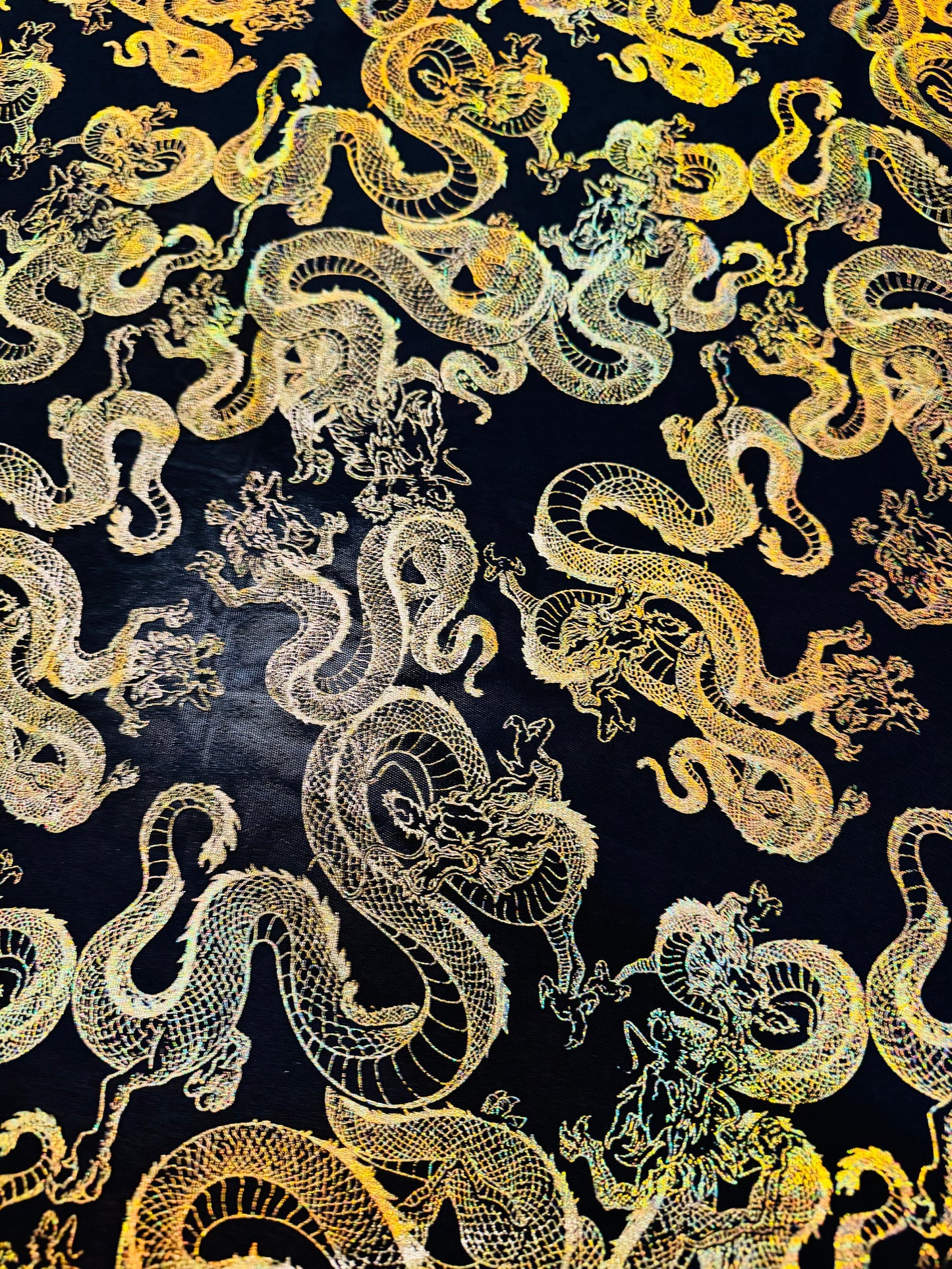 Exotic Dragon design Black/Gold metallic power mesh 4-way stretch 58/60”