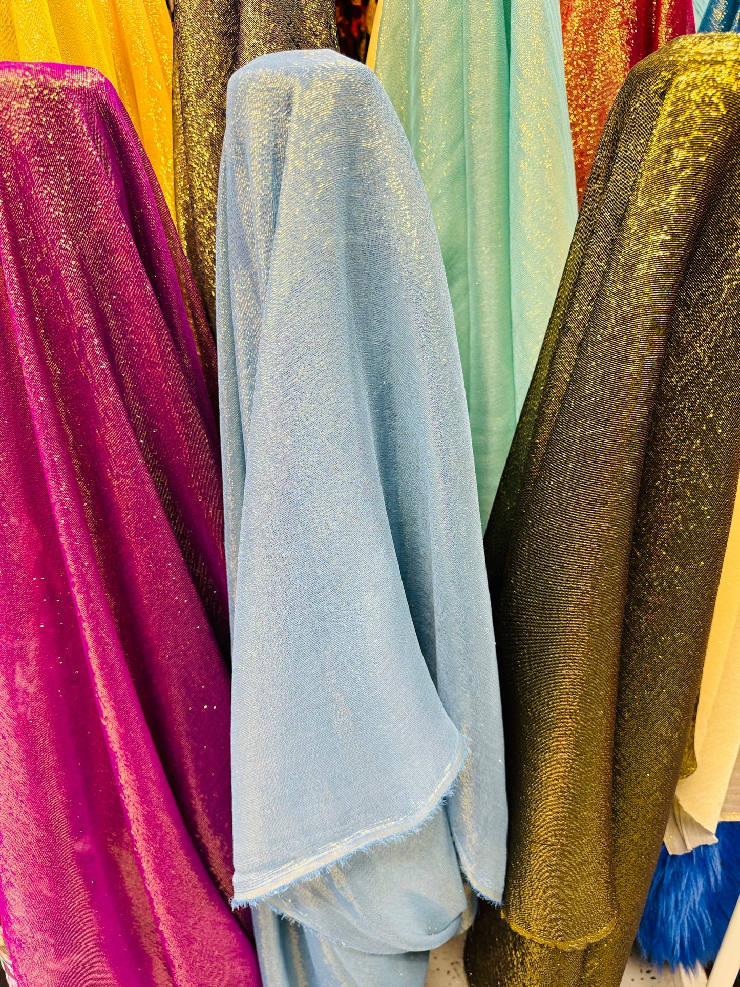 Silk metallic chiffon multi colors 2way Stretch 44/45" Sold by the YD. Ships worldwide from Los Ángeles California USA.