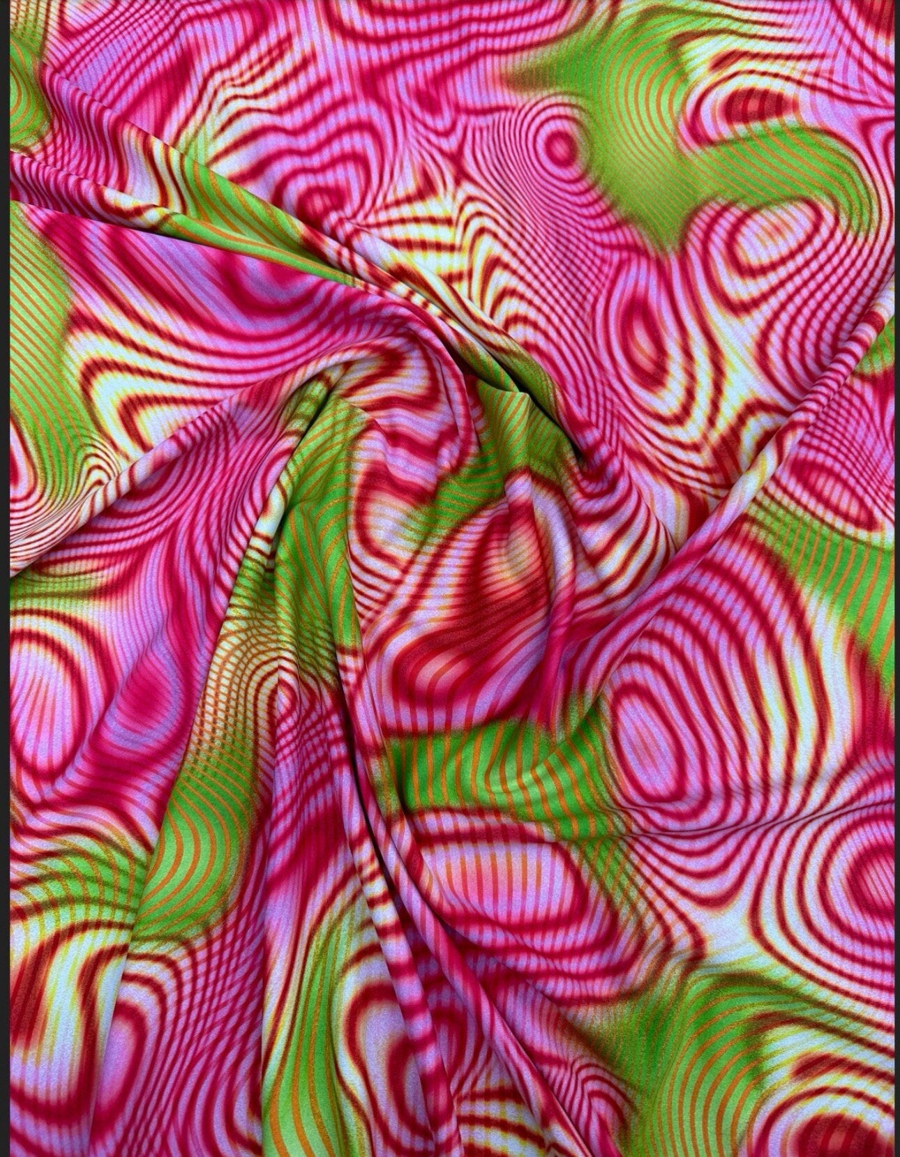 New modern Lava abstract design print on great quality of nylon spandex 4-way stretch 58/60” Sold by the YD.