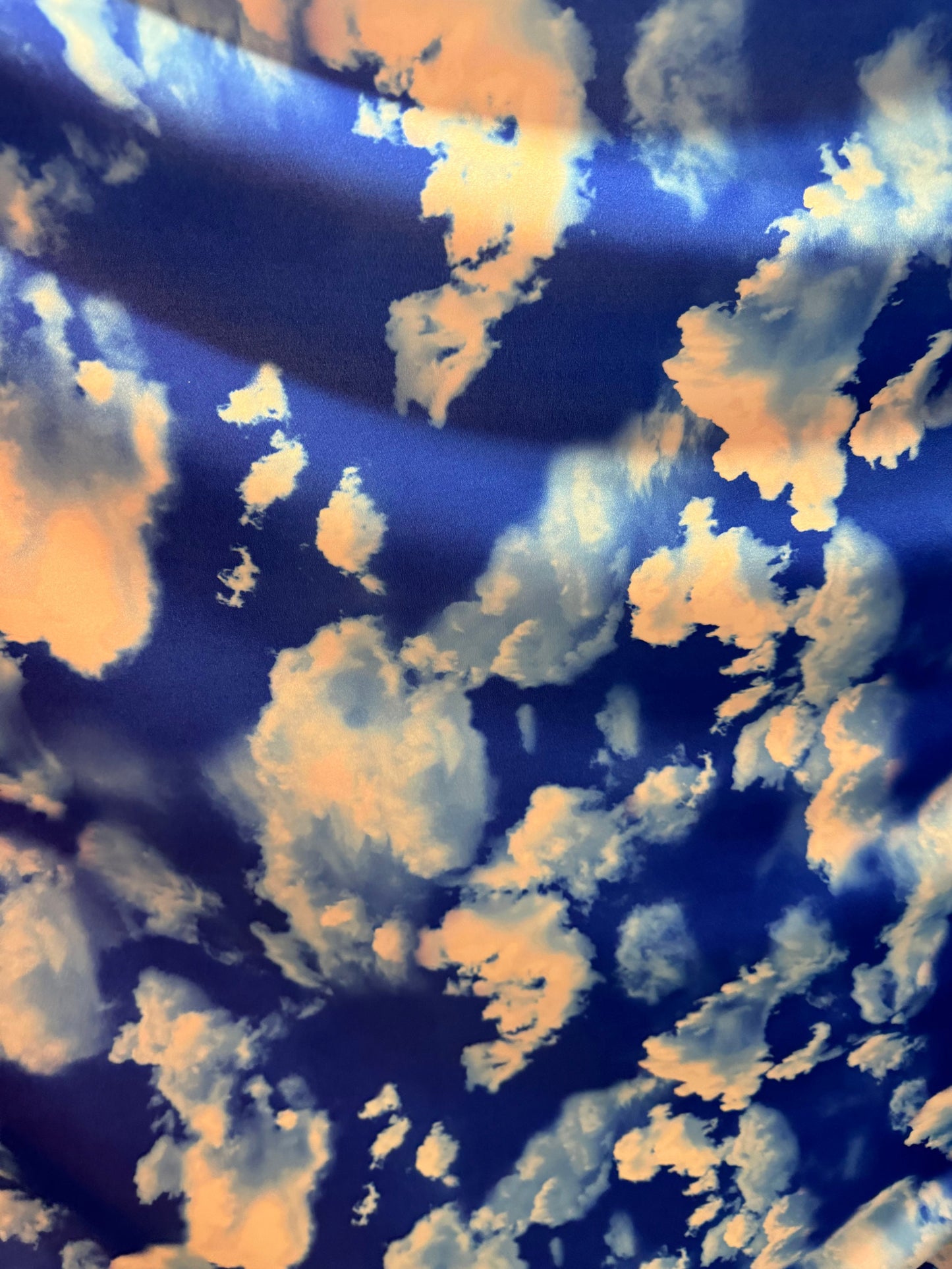 Clouds design blue/white print on great quality of nylon spandex 4-way stretch 58/60”