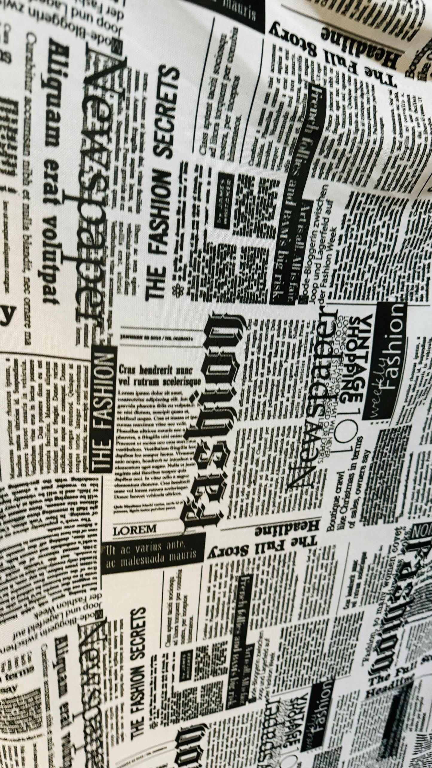 Newspaper design print on great quality of power mesh 4-way stretch 58/60”