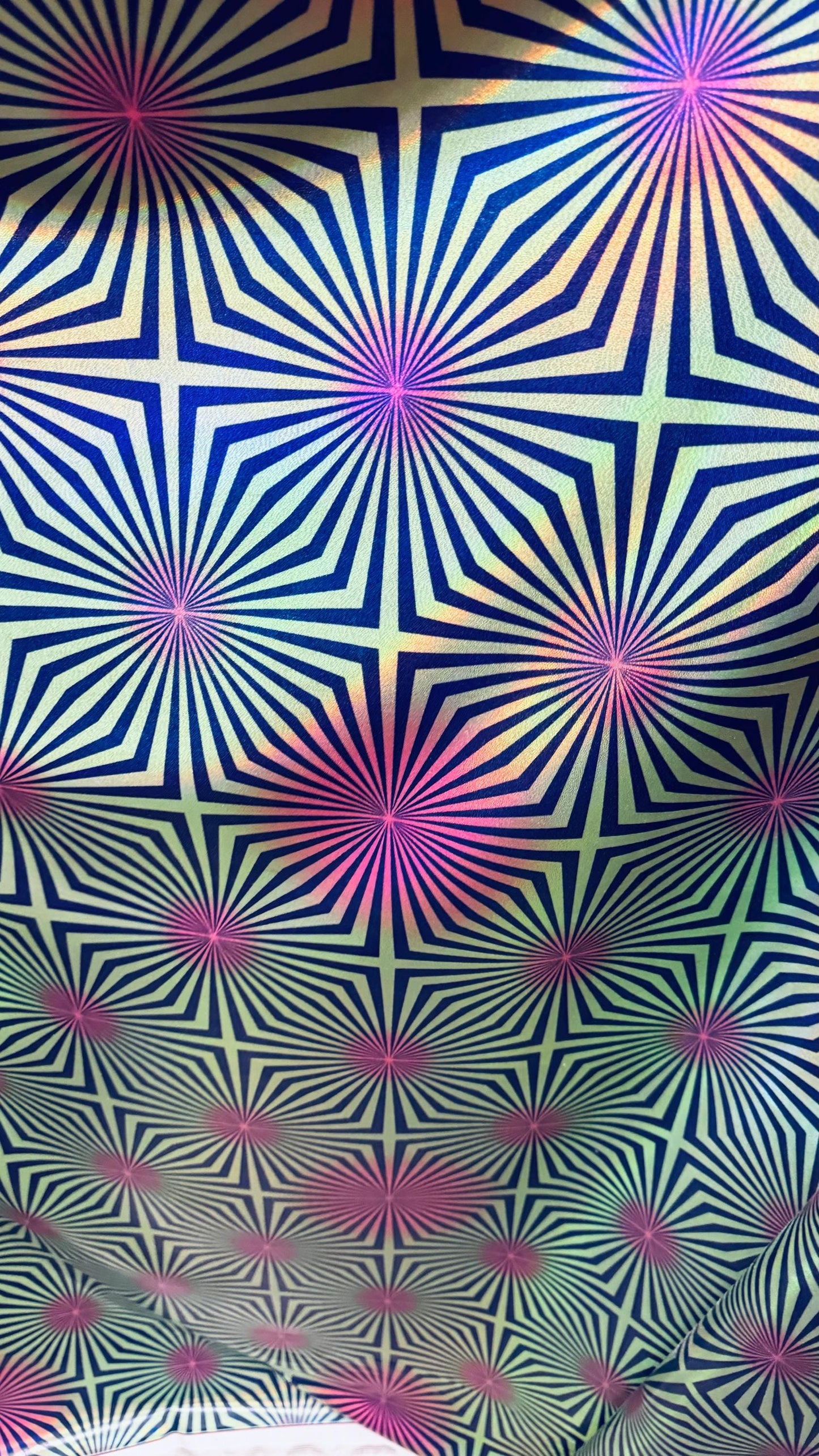 New psychedelic abstract design on metallic iridescent foggy foil metallic nylon spandex 4-way stretch 58/60” High quality fabrics by AlexLA