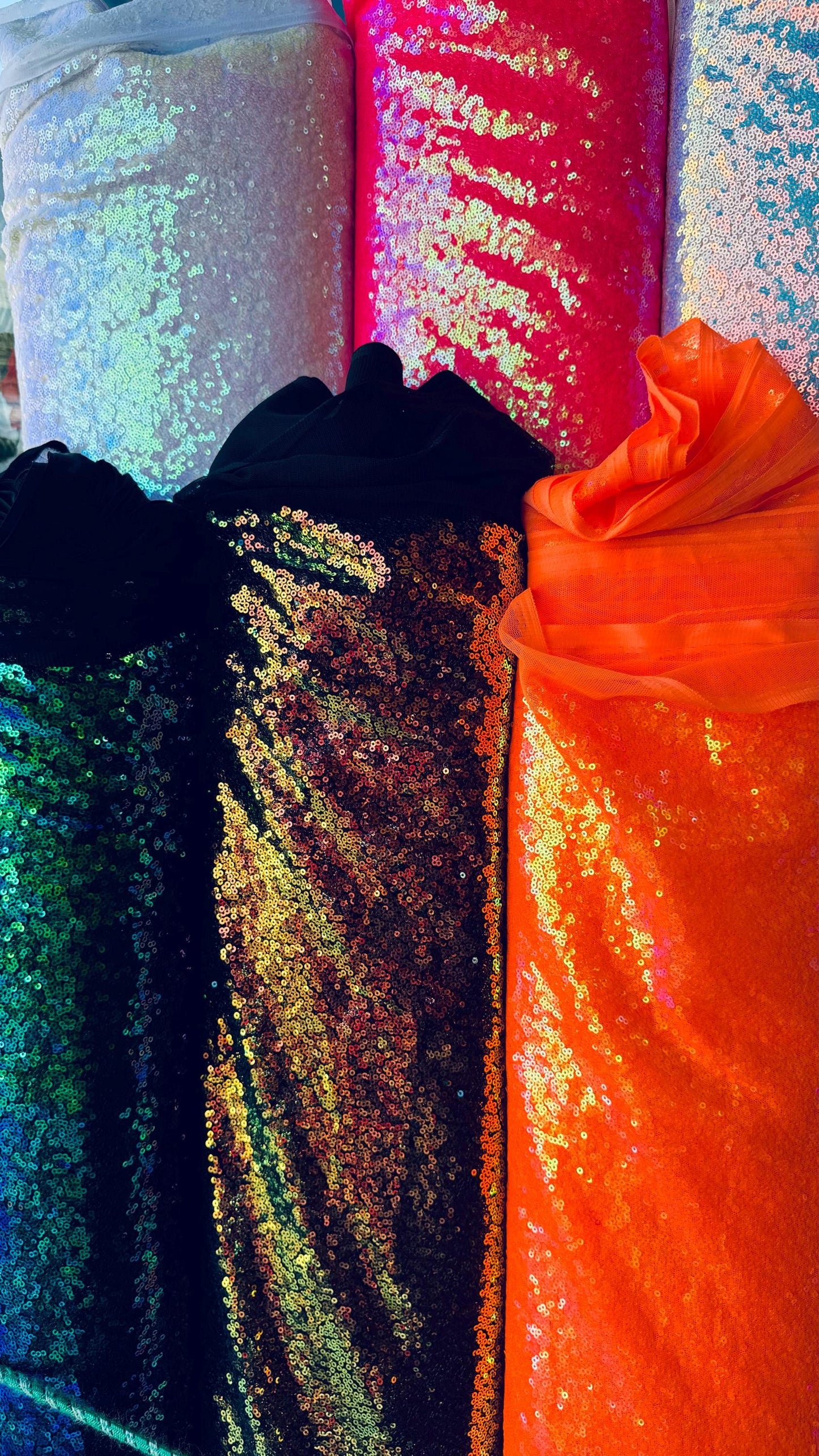 New neon colors iridescent mini sequins design embroidered on spandex mesh 2-way stretch 58/60” Sold by the YD. Ships Worldwide from L.A