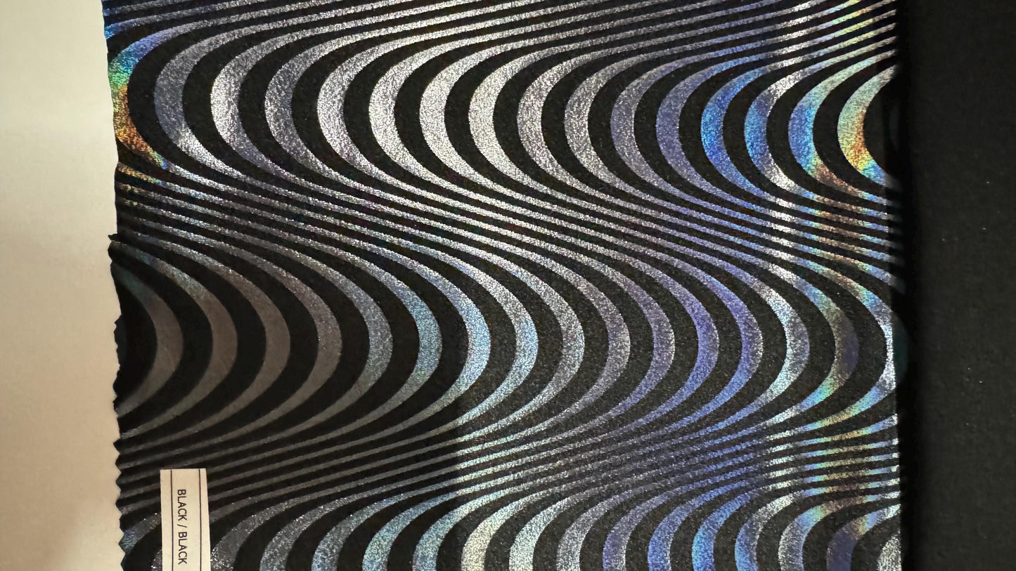 New abstract Wavy design print on great quality of Nylon spandex with iridescent foil 4-way stretch 58/60” Sold by the YD. Ships worldwide