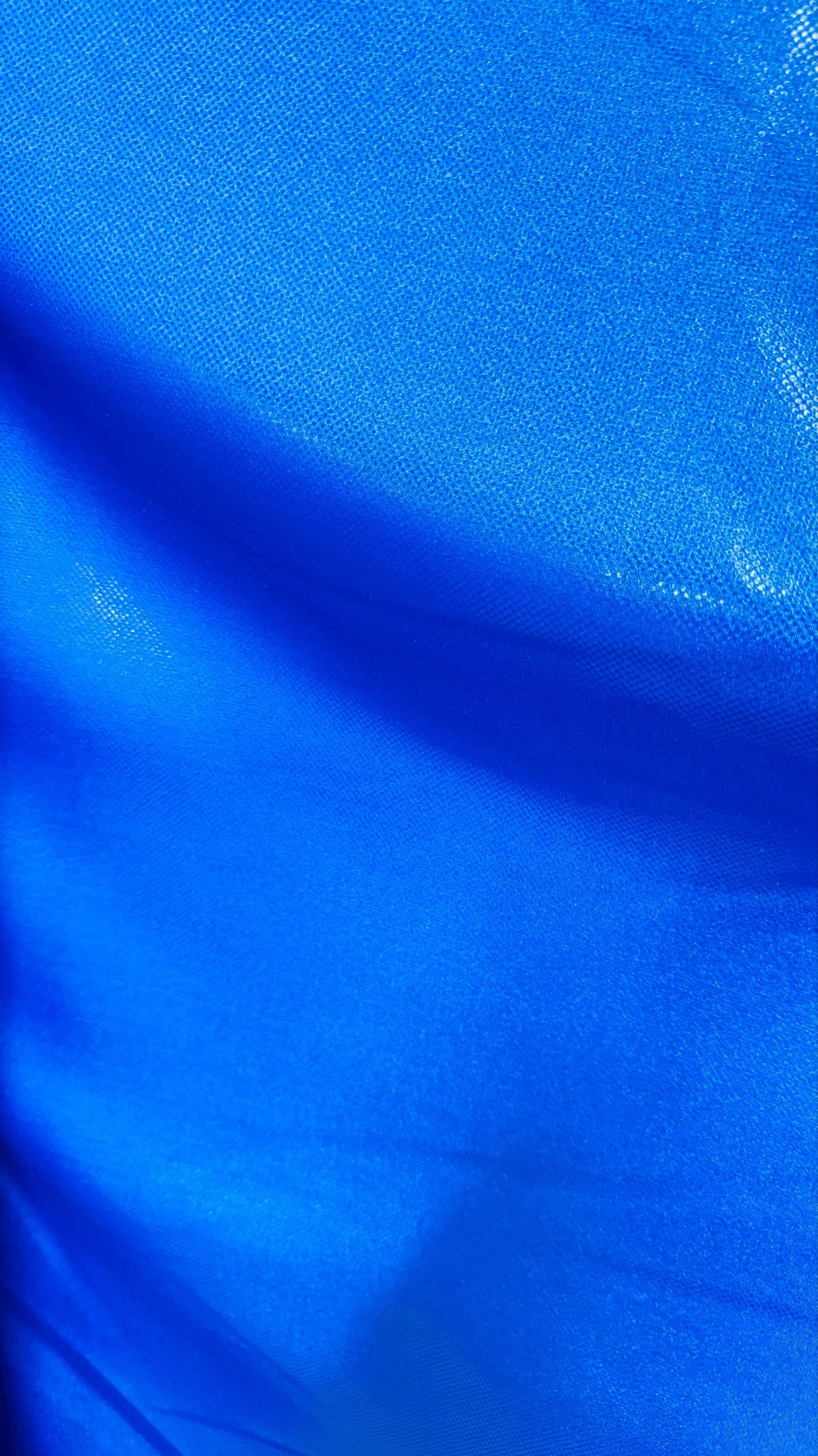 Sapphire metallic dots nylon spandex 4way stretch 58/60" Sold by the YD. Ships worldwide from Los Angeles California USA