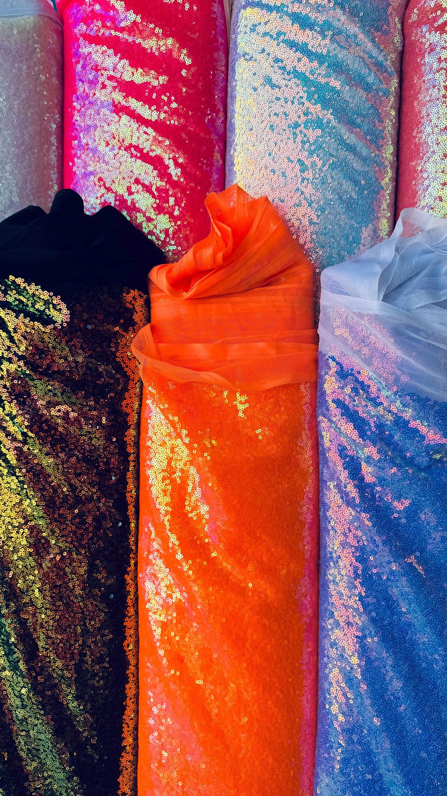 New neon colors iridescent mini sequins design embroidered on spandex mesh 2-way stretch 58/60” Sold by the YD. Ships Worldwide from L.A