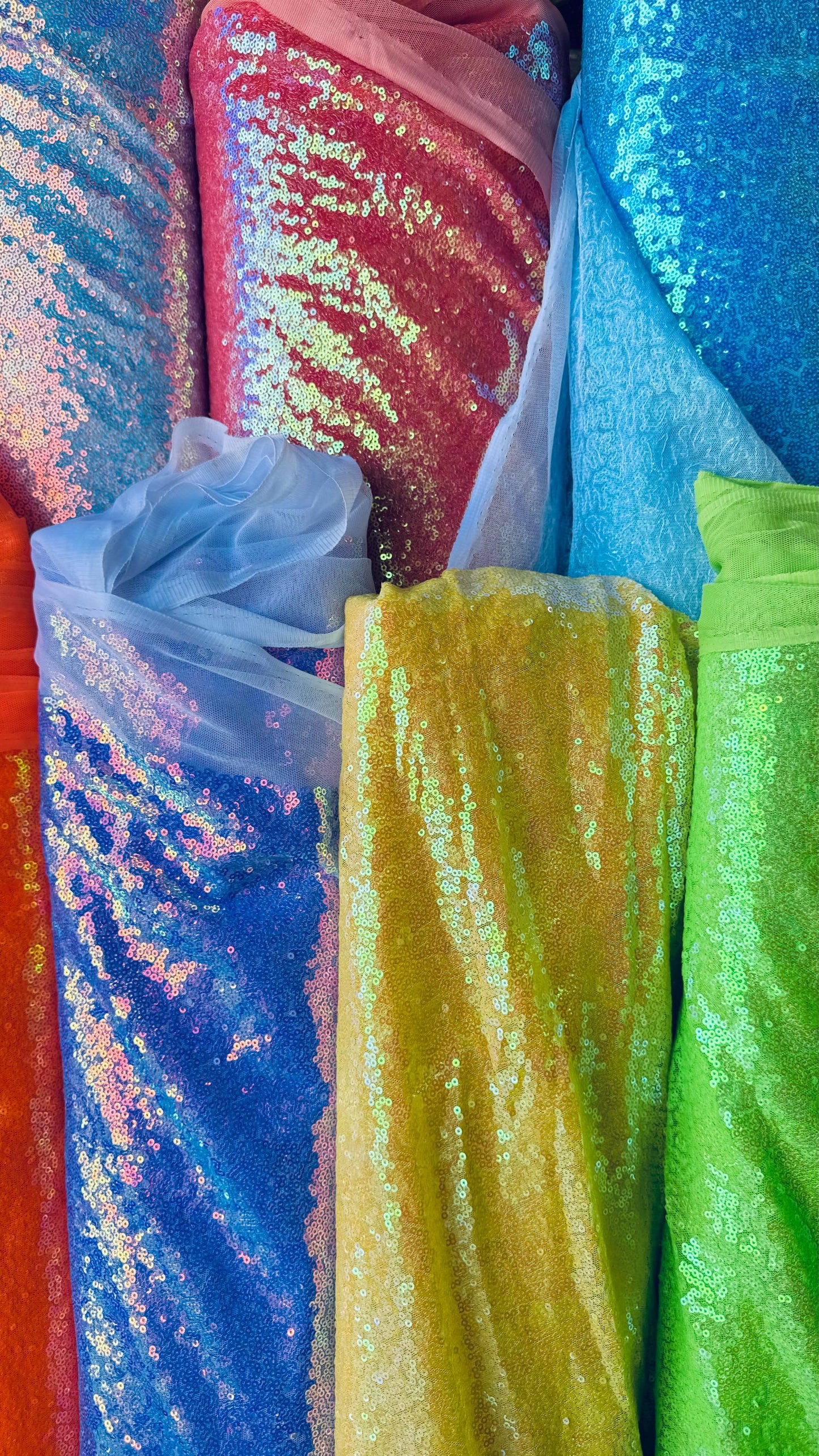 New neon colors iridescent mini sequins design embroidered on spandex mesh 2-way stretch 58/60” Sold by the YD. Ships Worldwide from L.A