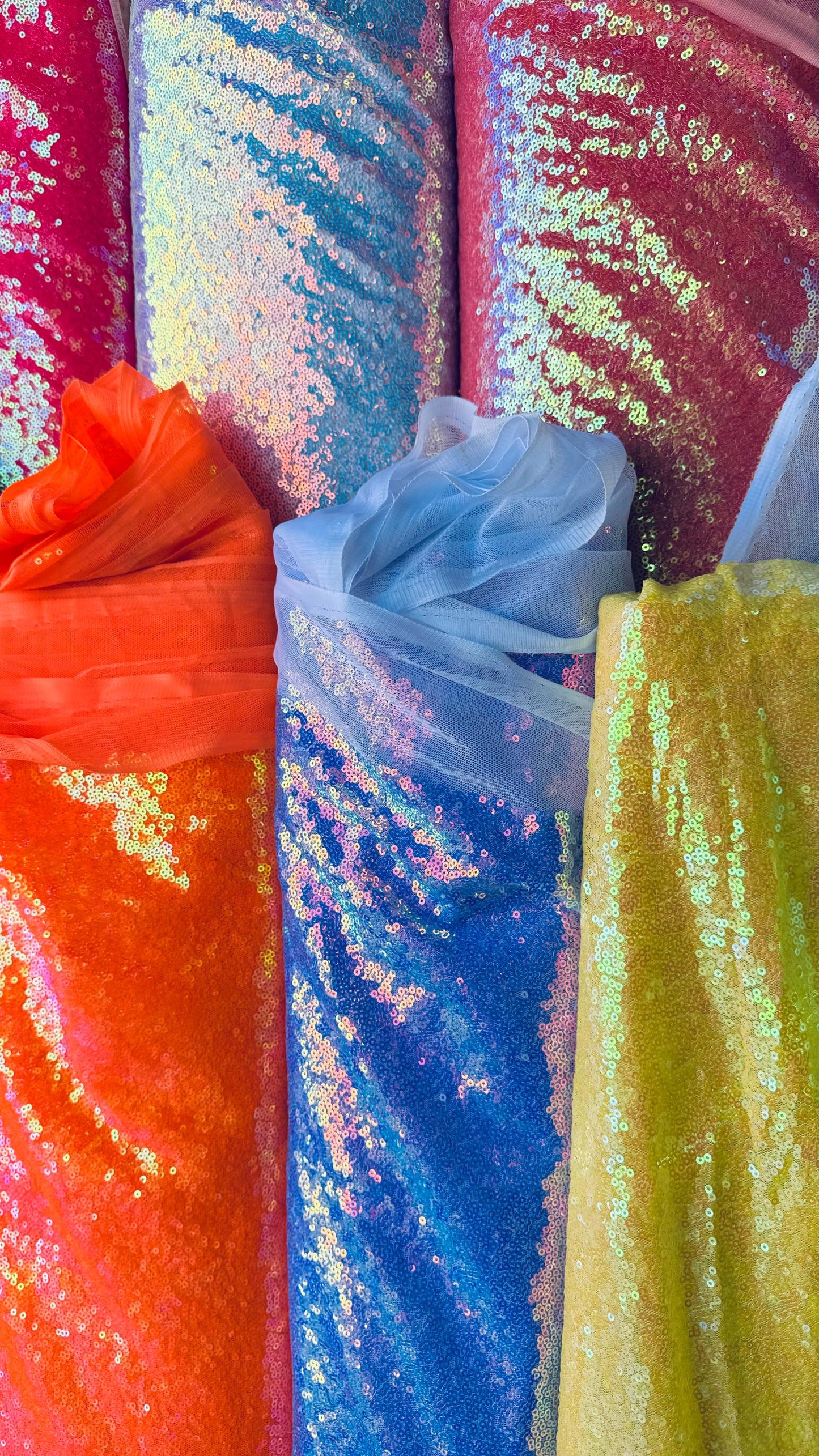 New neon colors iridescent mini sequins design embroidered on spandex mesh 2-way stretch 58/60” Sold by the YD. Ships Worldwide from L.A