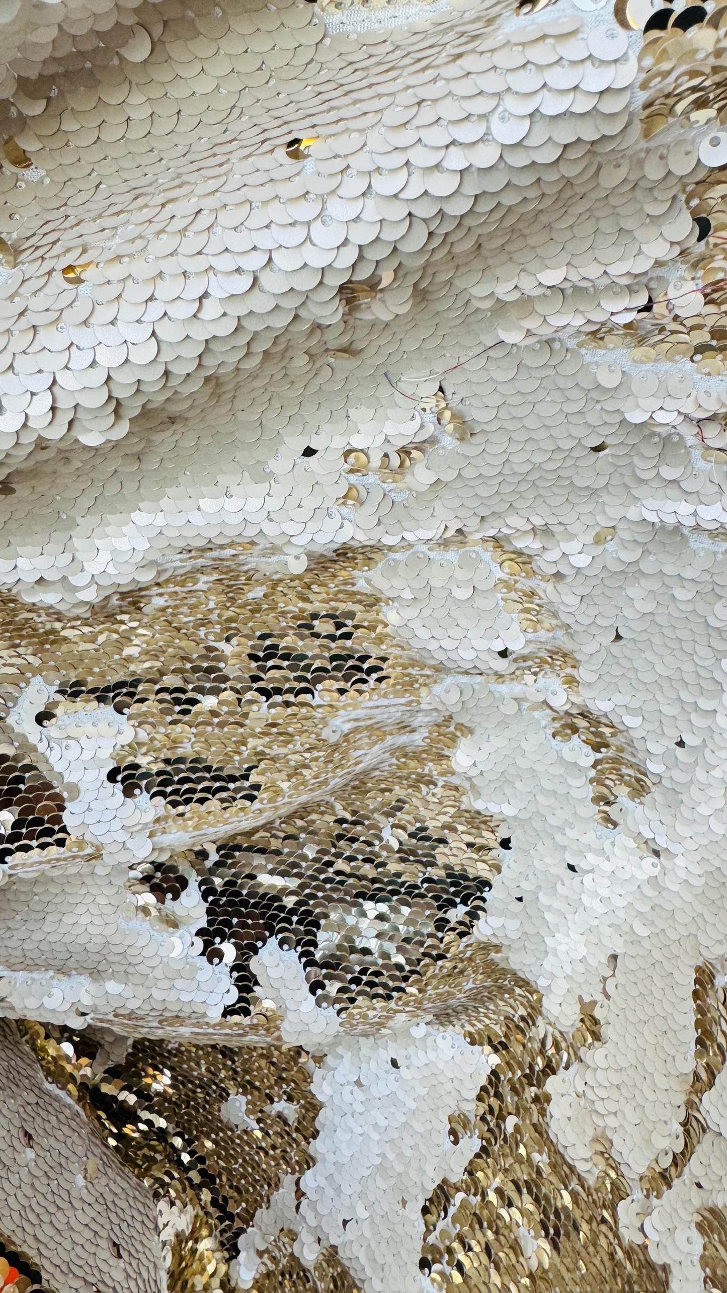 Flip up sequins Taupe/Gold reversible 2 tone sequins with spandex base 58/60" sold by the yd. ships worldwide from Los Angeles California.