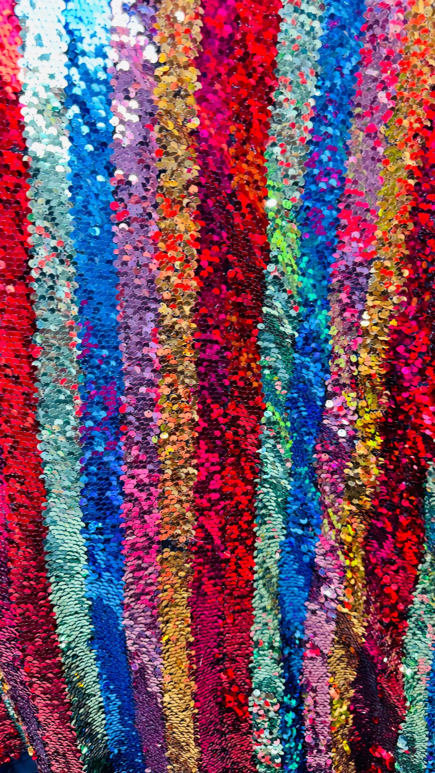 New Stripes design multicolor rainbow sequins on stretch mesh 4-way 55/57” Sold by the YD. Ships worldwide from Los Angeles California USA.