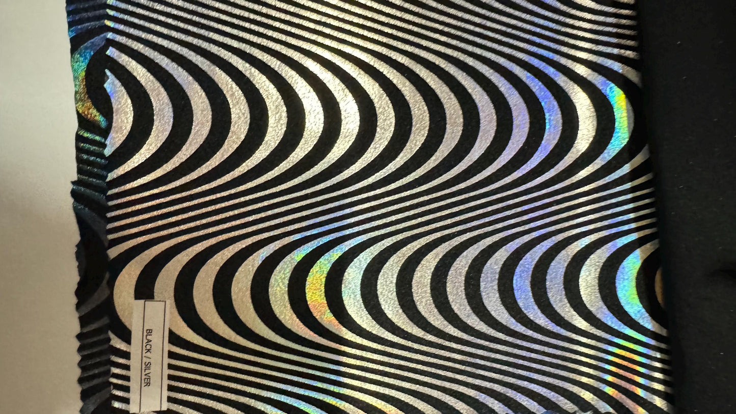 New abstract Wavy design print on great quality of Nylon spandex with iridescent foil 4-way stretch 58/60” Sold by the YD. Ships worldwide