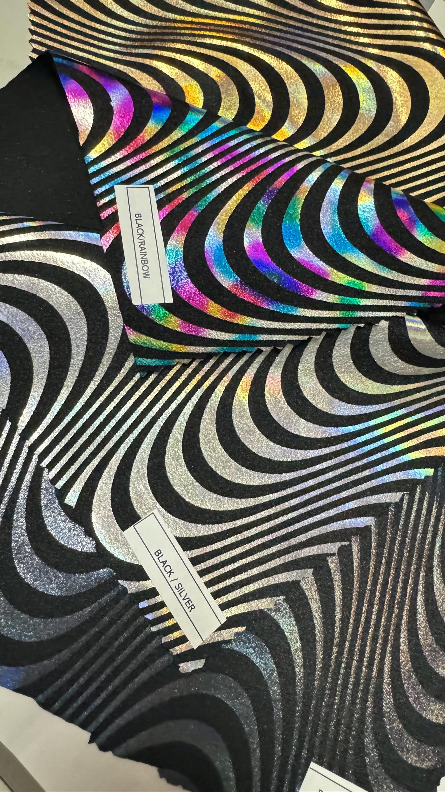 New abstract Wavy design print on great quality of Nylon spandex with iridescent foil 4-way stretch 58/60” Sold by the YD. Ships worldwide