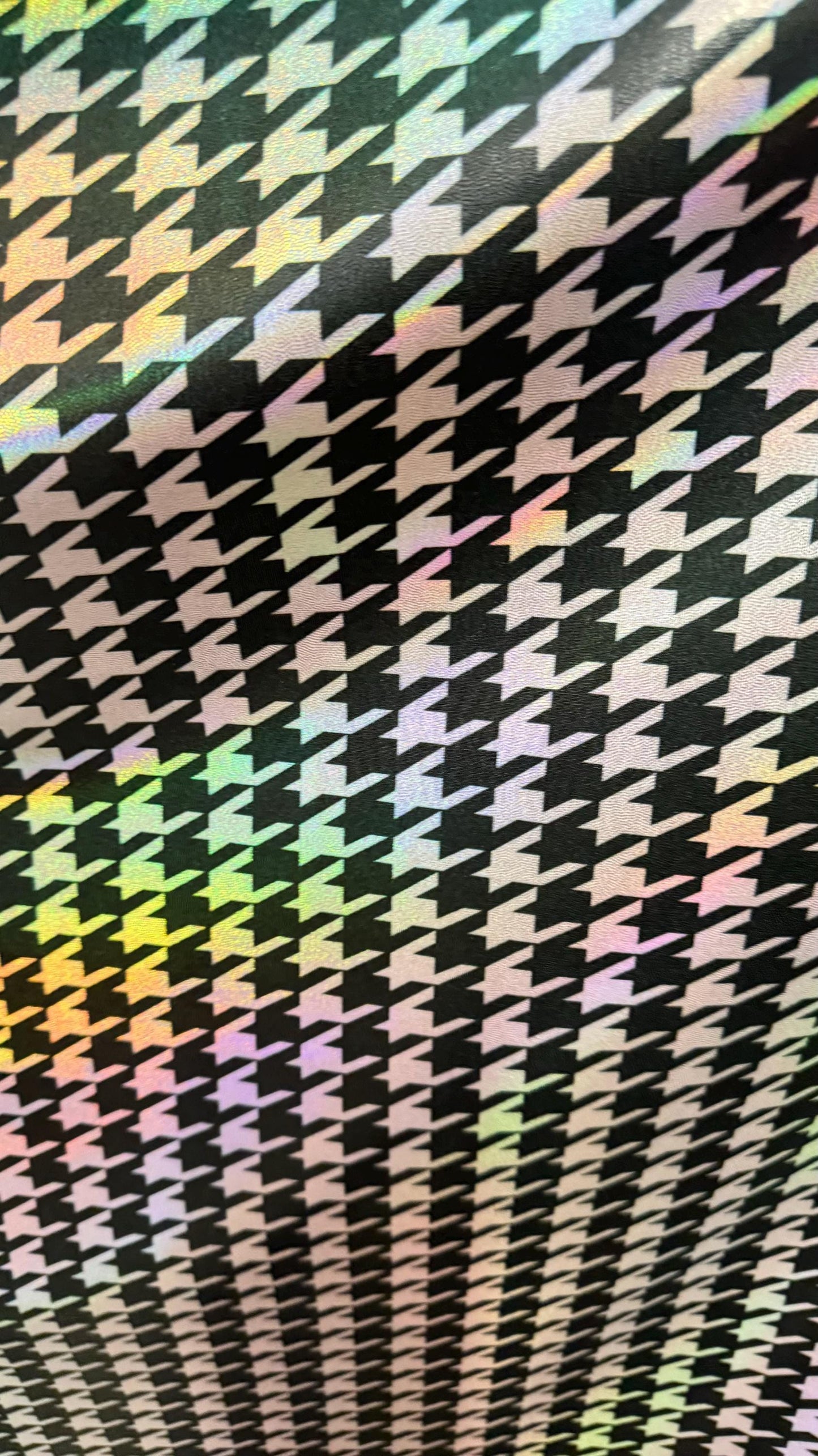Houndstooth design nylon spandex with iridescent foil 4way stretch 58/60" Sold by the yd. Ships worldwide from Los Angeles California USA.