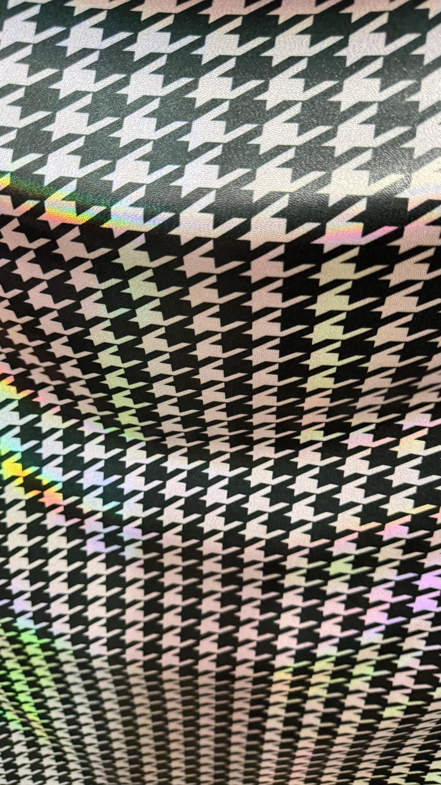 Houndstooth design nylon spandex with iridescent foil 4way stretch 58/60" Sold by the yd. Ships worldwide from Los Angeles California USA.
