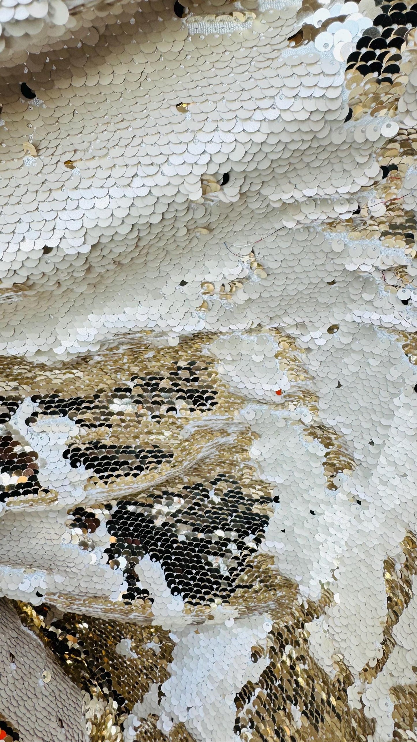 Flip up sequins Taupe/Gold reversible 2 tone sequins with spandex base 58/60" sold by the yd. ships worldwide from Los Angeles California.