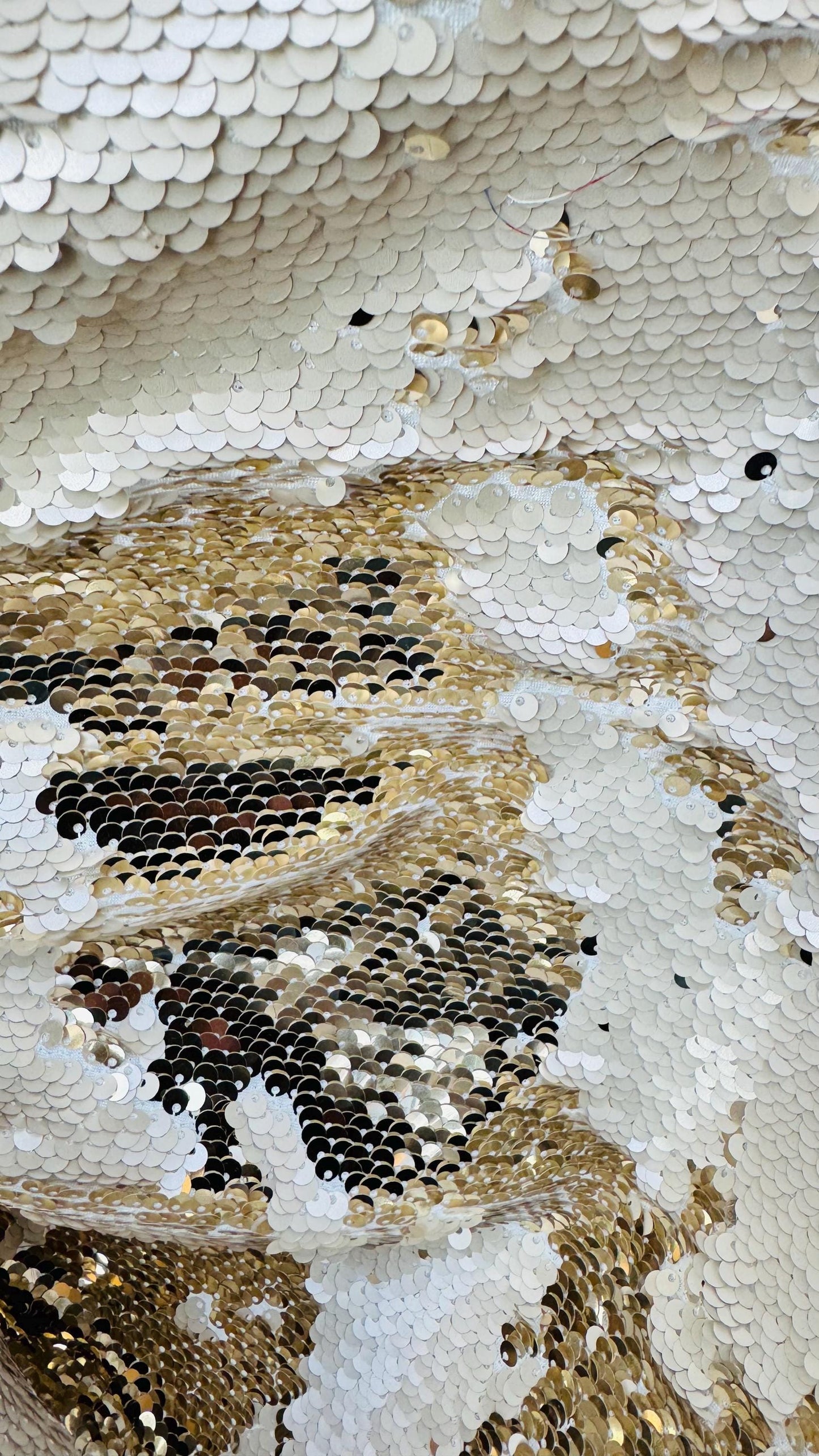 Flip up sequins Taupe/Gold reversible 2 tone sequins with spandex base 58/60" sold by the yd. ships worldwide from Los Angeles California.