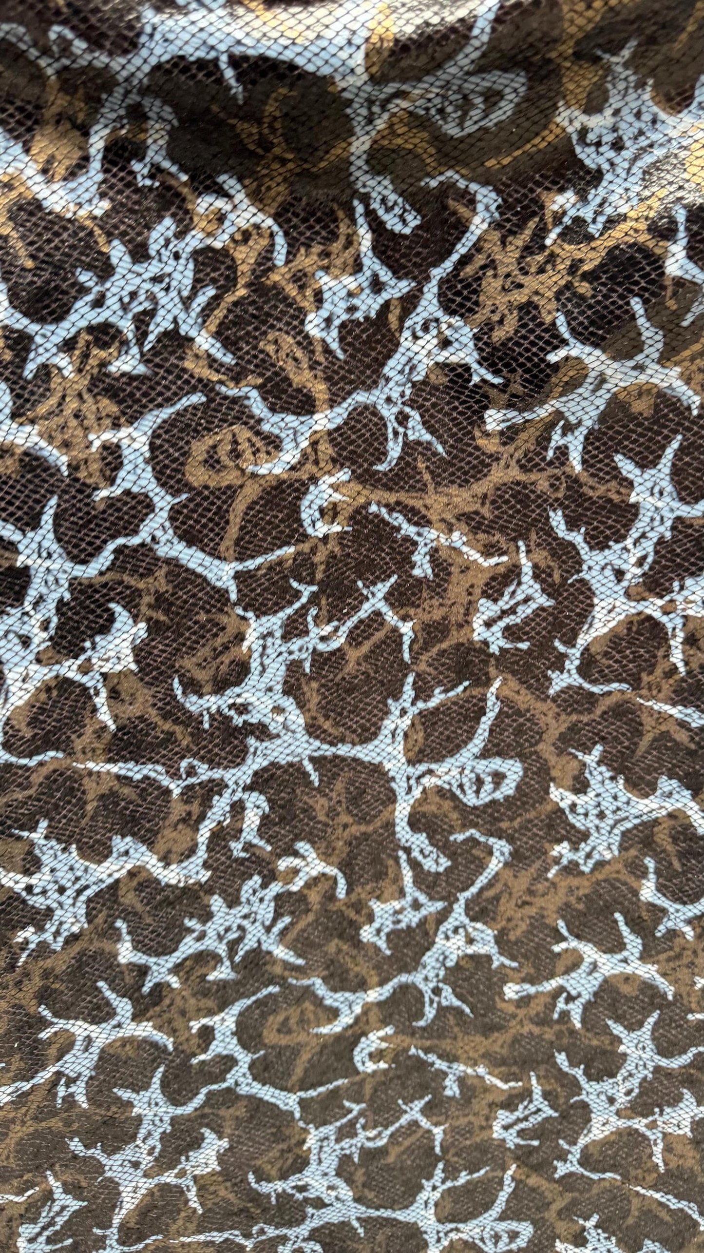 New Abstract design with skin snake foil on stretch velvet 2-way 58/60” Sold by the YD. Ships worldwide from Los Angeles California USA.