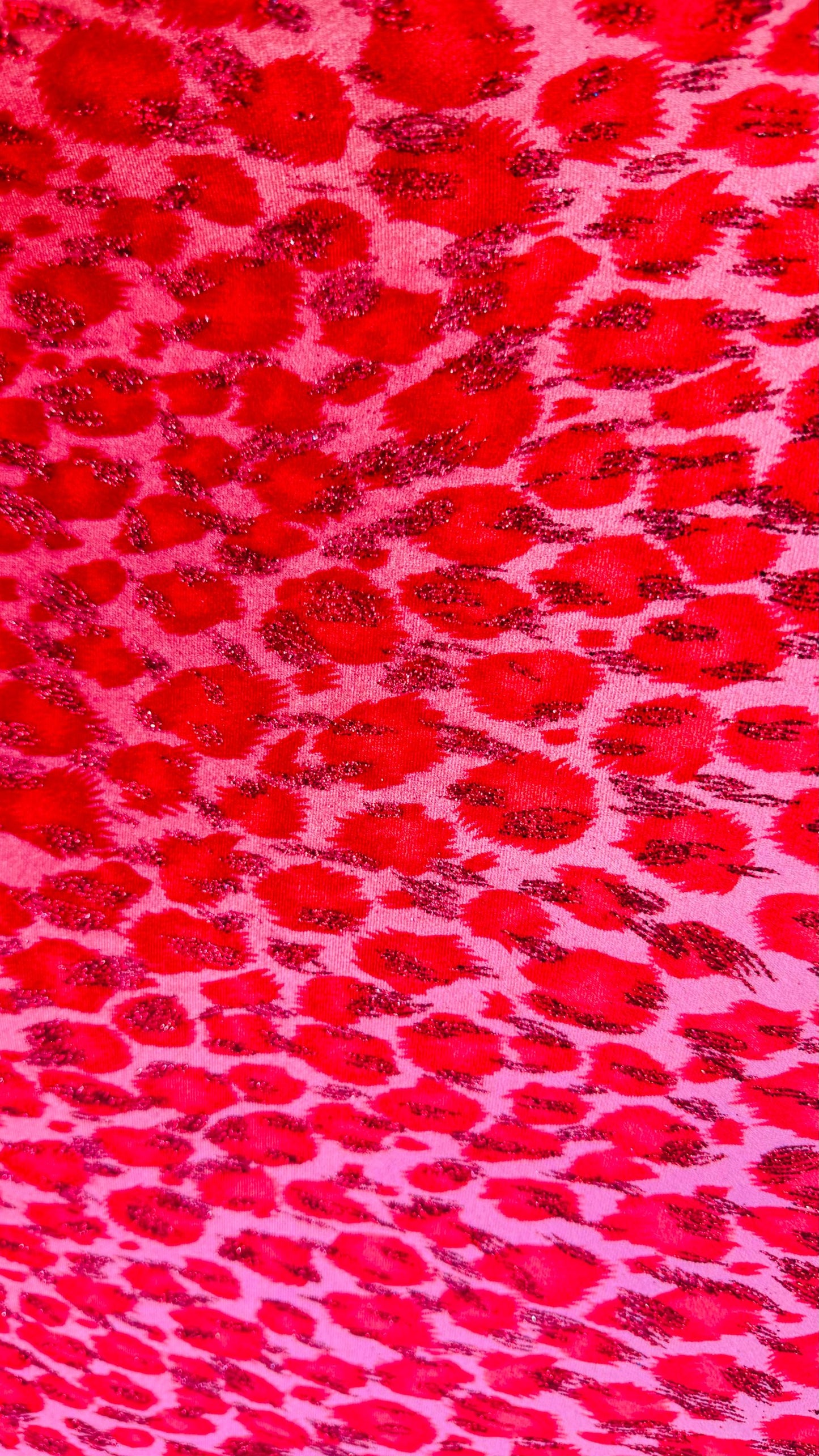 Leopard design Red/Pink with glitter print on velvet 420gsm 4way stretch 58/60” Sold by the YD. Ships worldwide from Los Angeles California