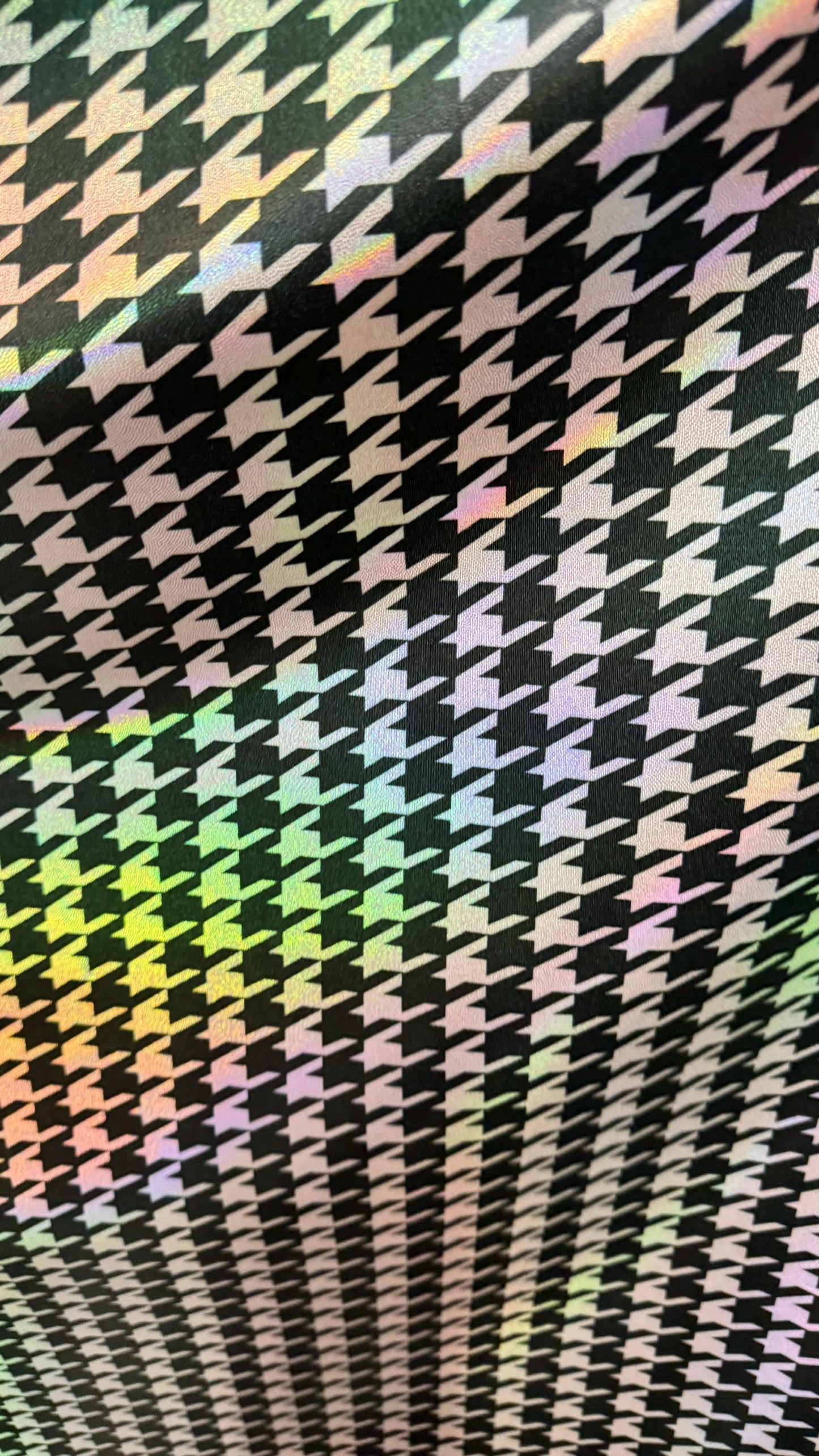 Houndstooth design nylon spandex with iridescent foil 4way stretch 58/60" Sold by the yd. Ships worldwide from Los Angeles California USA.
