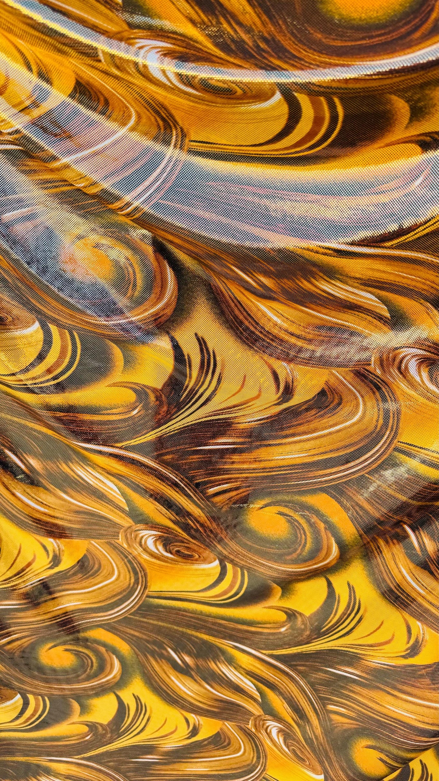 New tornado abstract design on poly spandex with super shiny foil 4way stretch 58/60" Sold by the YD. Ships worldwide from Los Angeles Ca