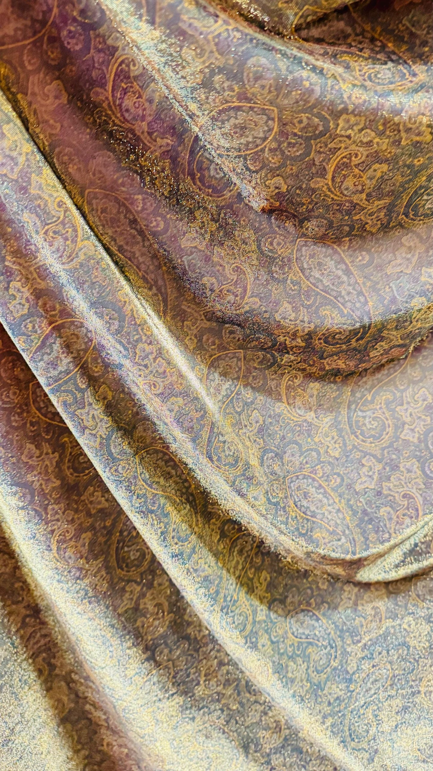 New metallic iridescent paisley mesh Gold/Multicolor 2-way stretch 58/60" Sold by the YD. Ships worldwide from Los Ángeles California USA.
