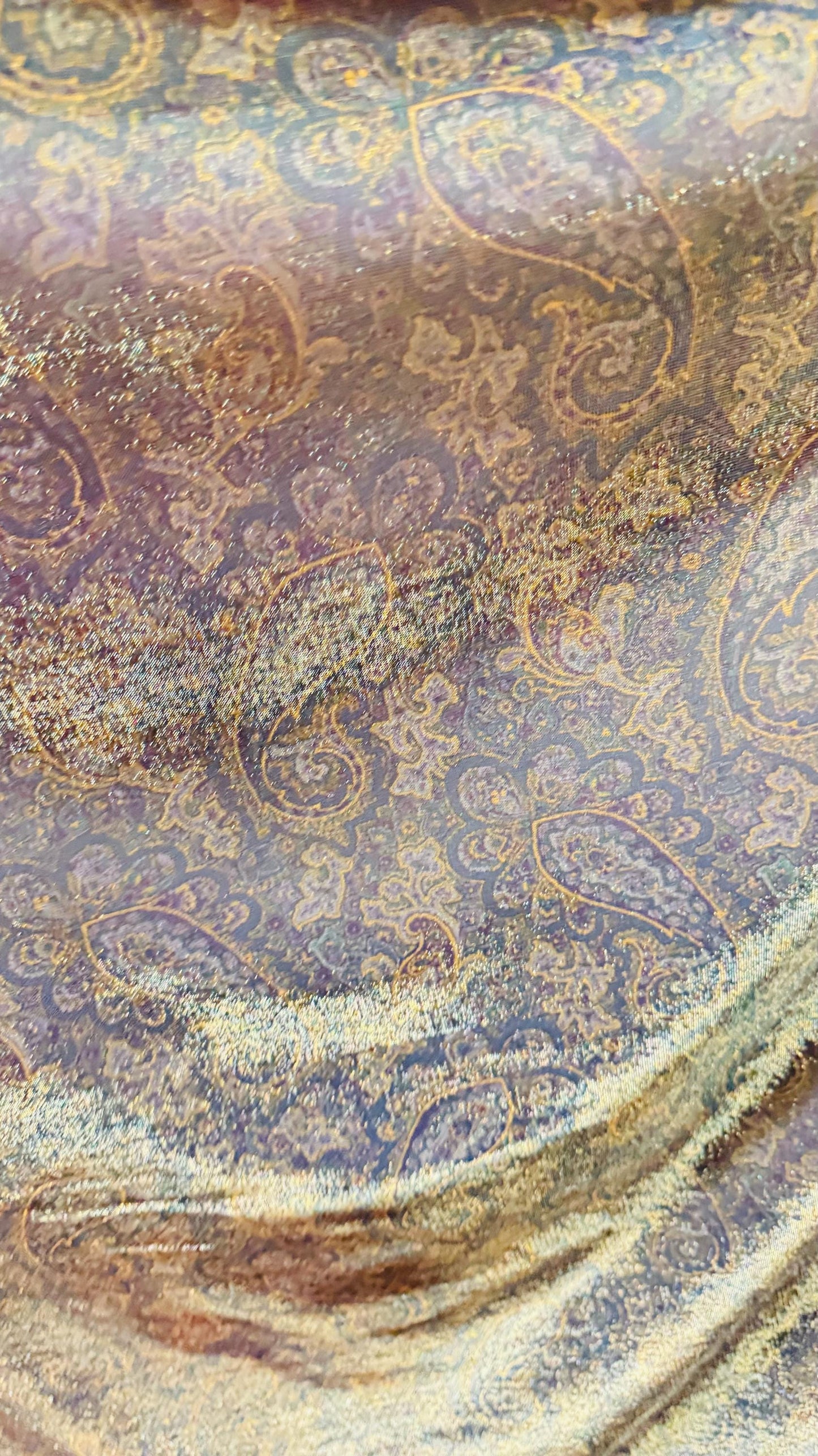 New metallic iridescent paisley mesh Gold/Multicolor 2-way stretch 58/60" Sold by the YD. Ships worldwide from Los Ángeles California USA.
