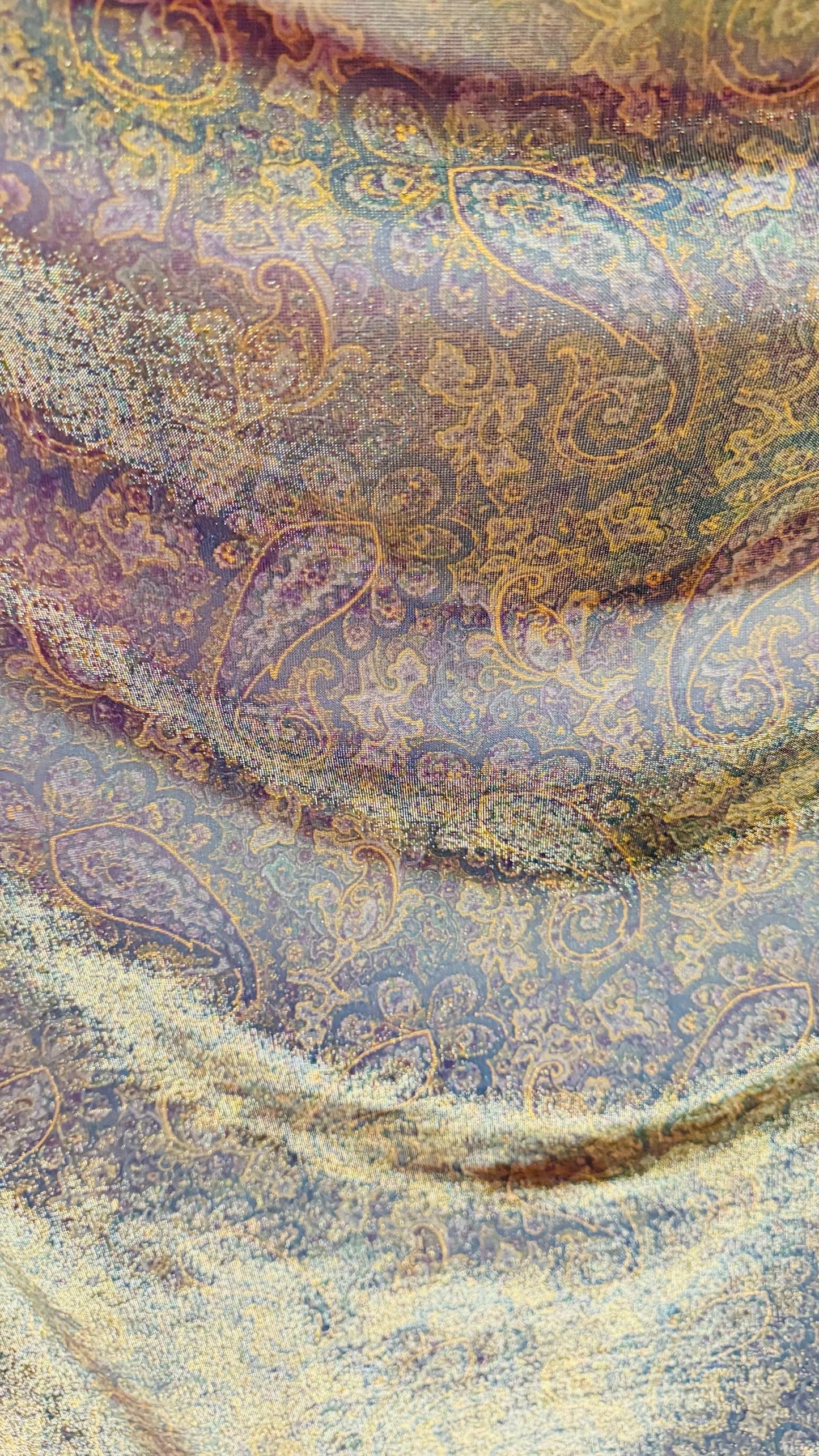 New metallic iridescent paisley mesh Gold/Multicolor 2-way stretch 58/60" Sold by the YD. Ships worldwide from Los Ángeles California USA.