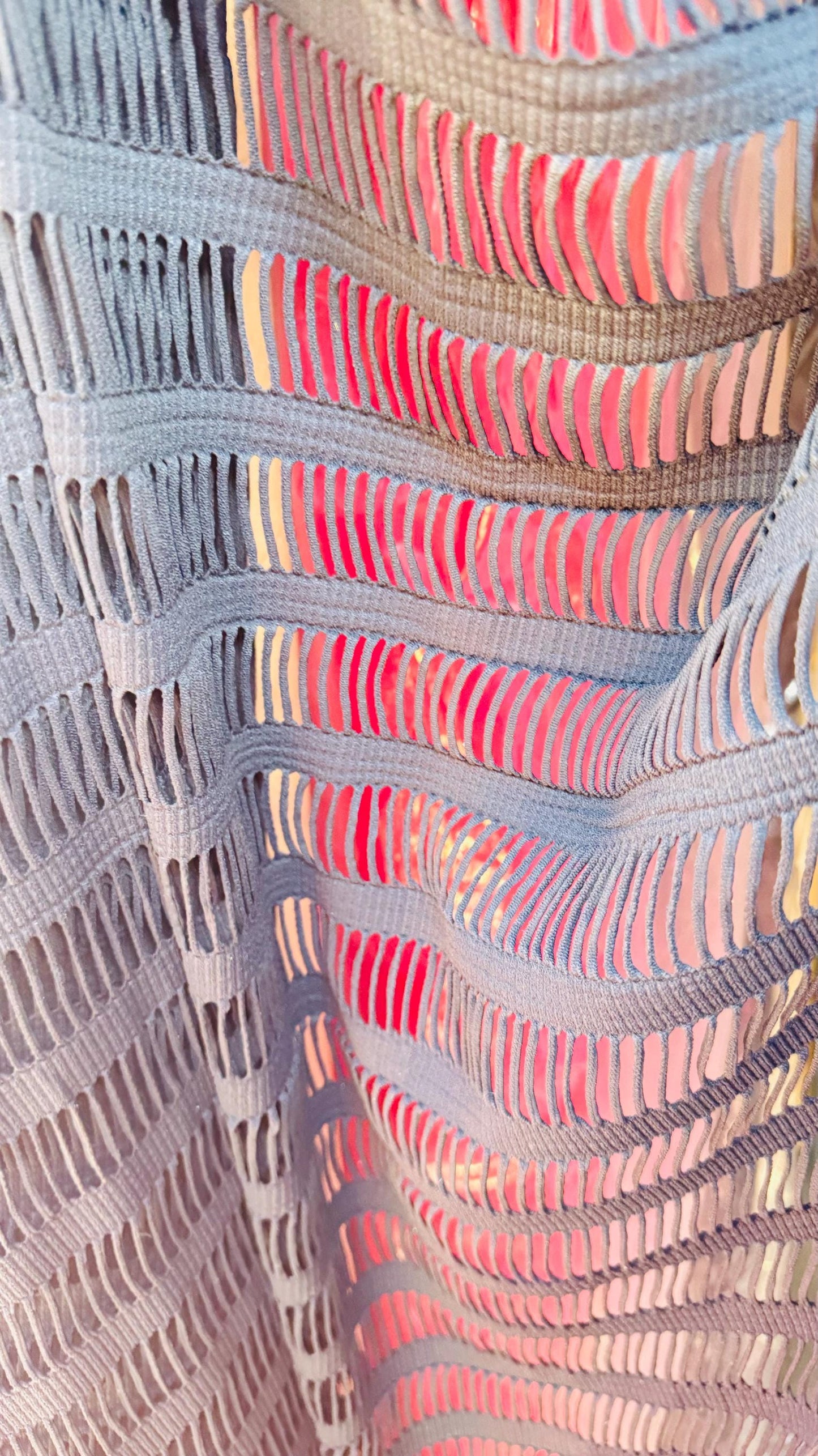 Fringe design Luxury nylon spandex 4-way stretch 55/57” Sold by the YD. Ships worldwide from Los Angeles California USA.