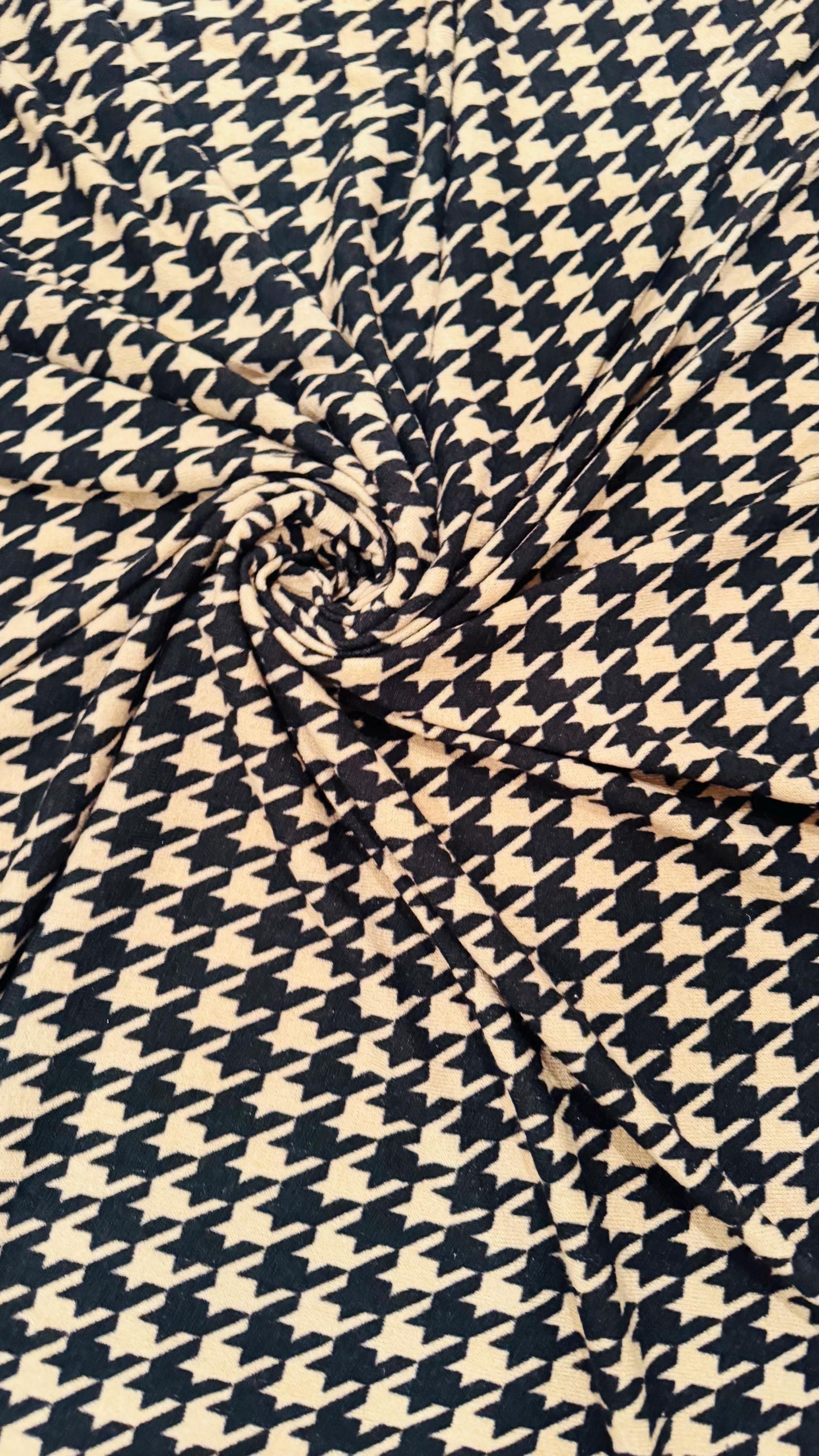 New Modern brand Houndstooth design print on sweater knit 2-way stretch 58/60” Sold by the YD. Ships worldwide from Los Angeles California
