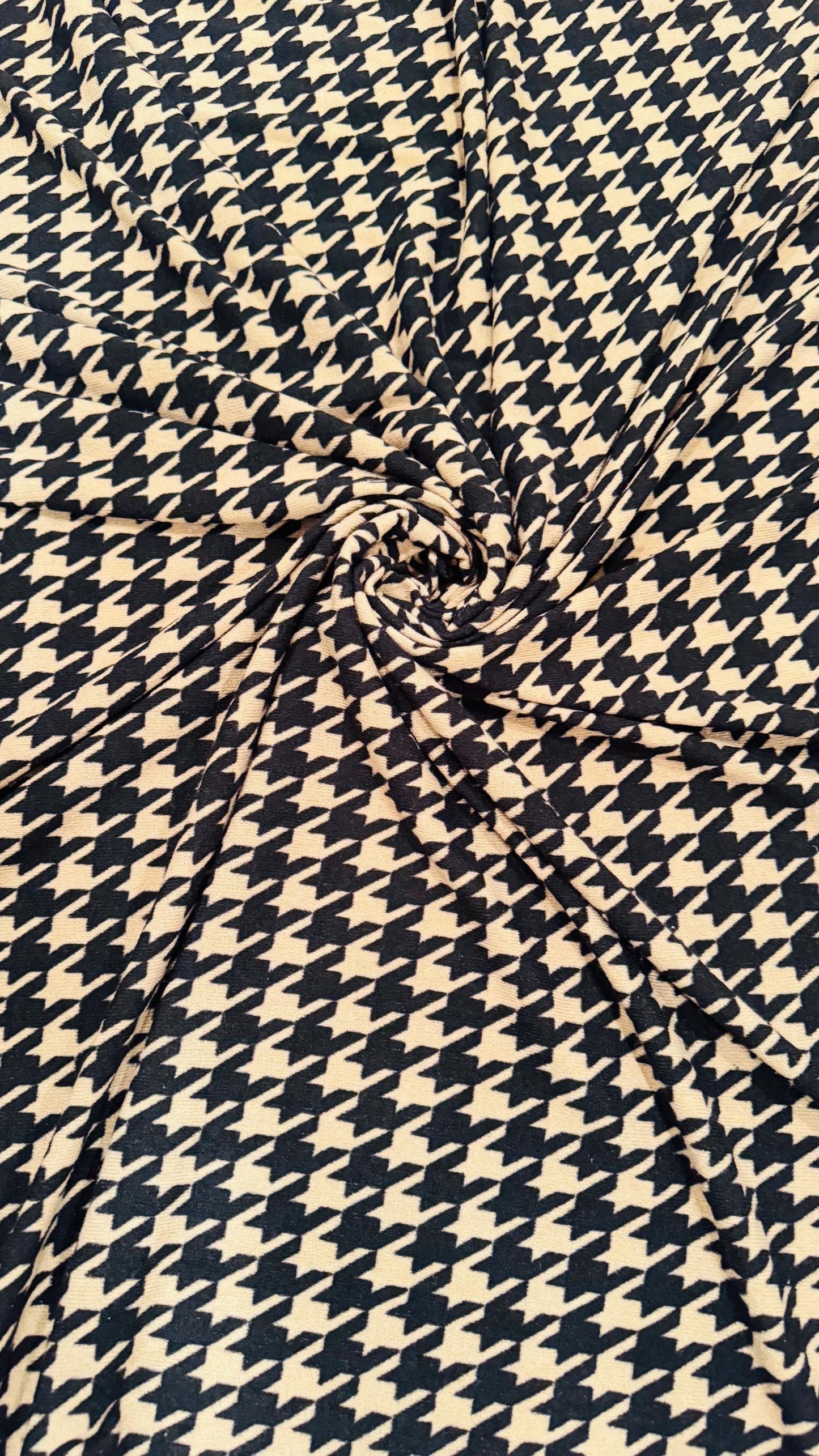 New Modern brand Houndstooth design print on sweater knit 2-way stretch 58/60” Sold by the YD. Ships worldwide from Los Angeles California
