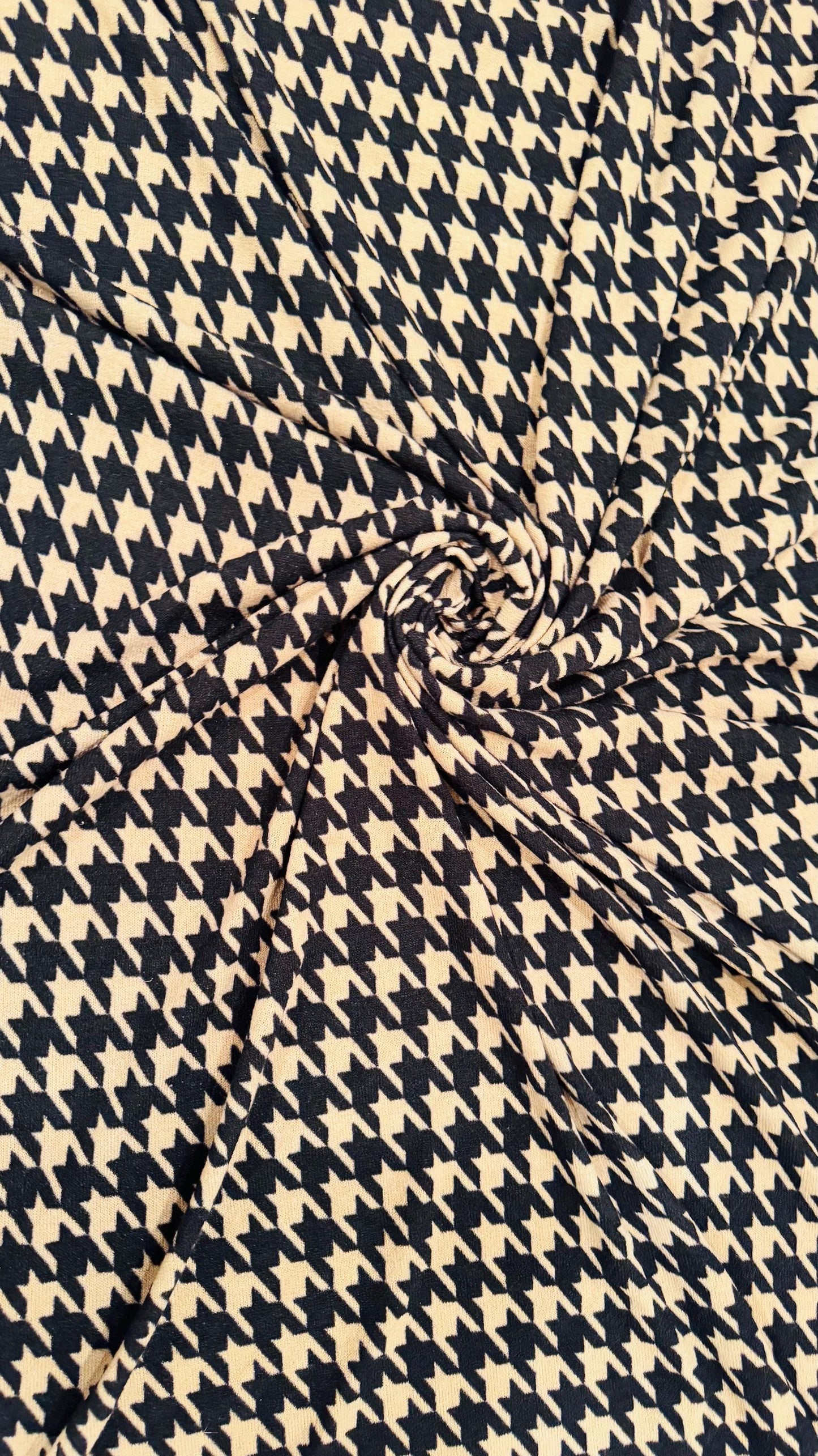 New Modern brand Houndstooth design print on sweater knit 2-way stretch 58/60” Sold by the YD. Ships worldwide from Los Angeles California