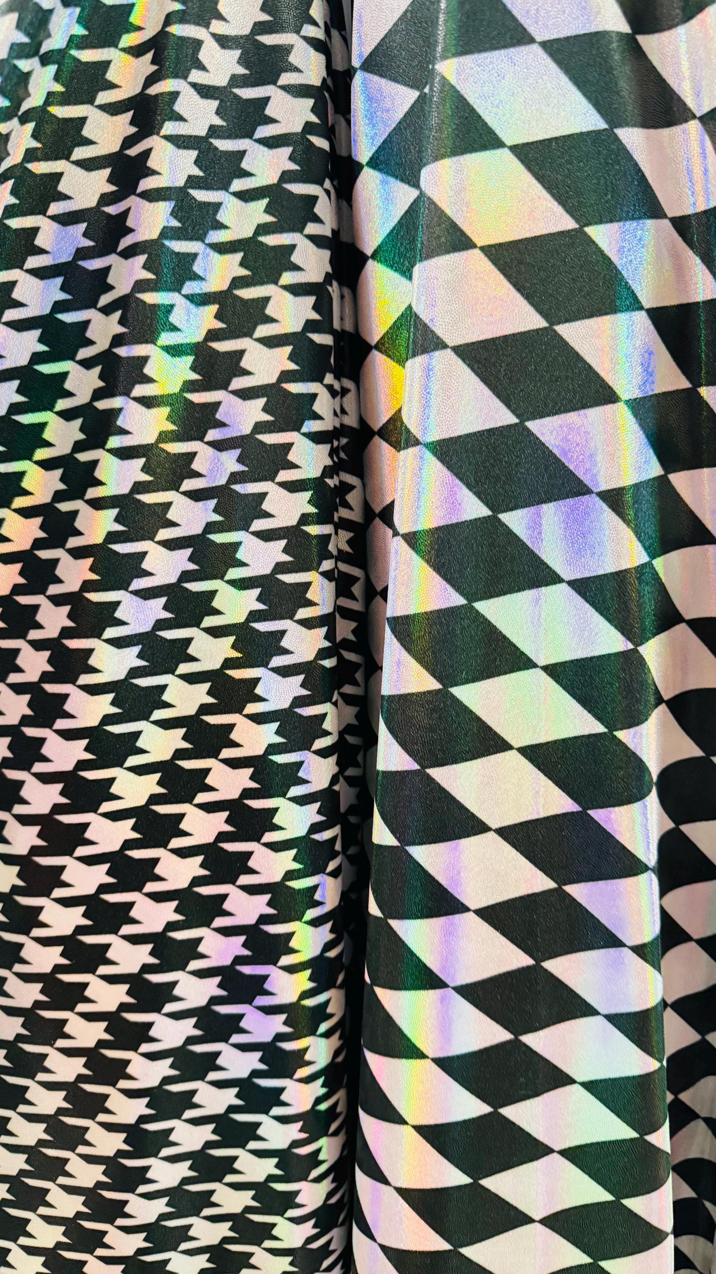 New Diamond and Houndstooth design Iridescent metallic nylon spandex 4way stretch 58/60" Sold by the YD. Ships worldwide from Los Angeles CA