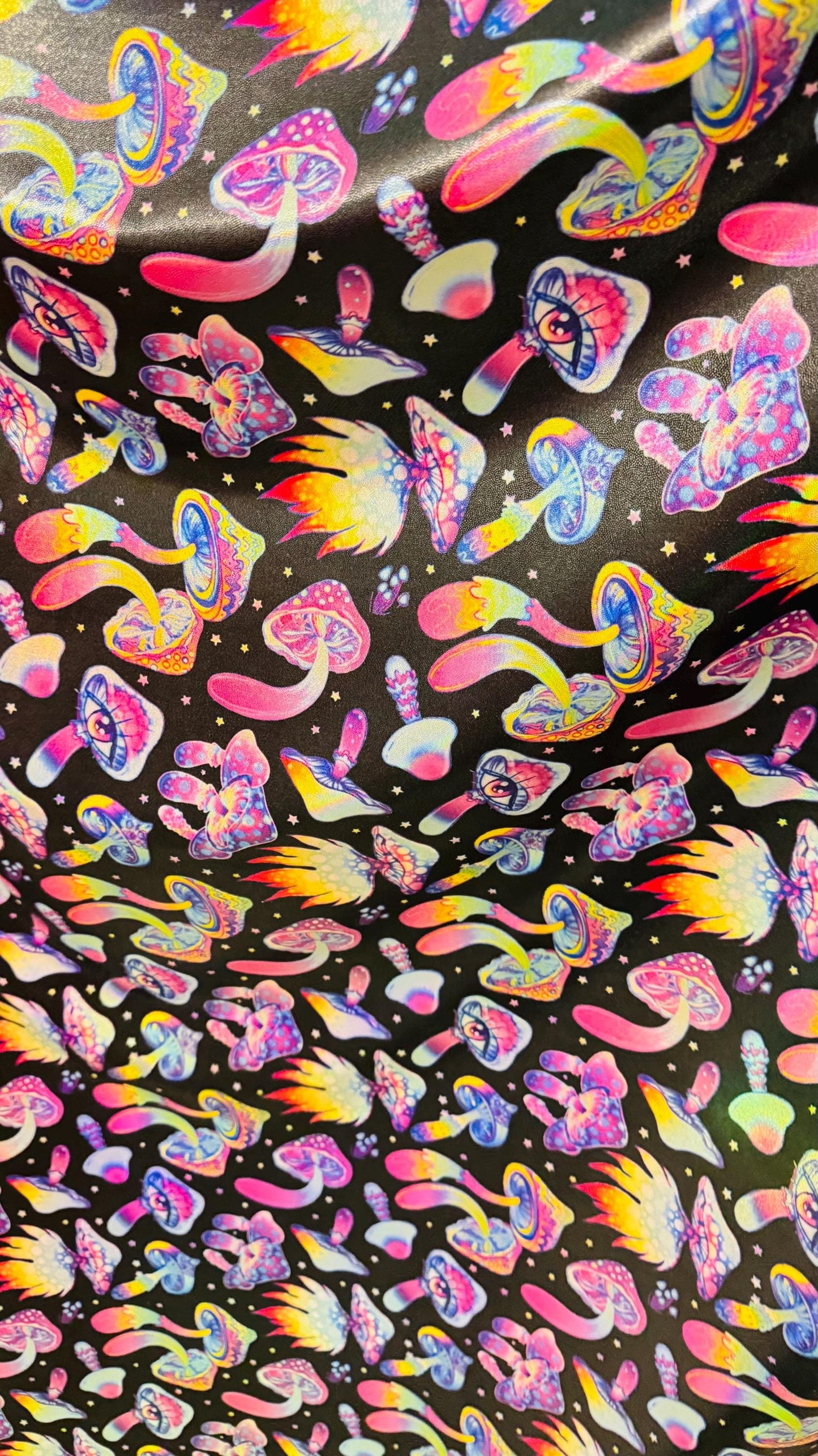 3D Mushrooms design Black multicolor print on Iridescence metallic heavy quality of nylon spandex 4-way stretch 58/60” Sold by the YD.