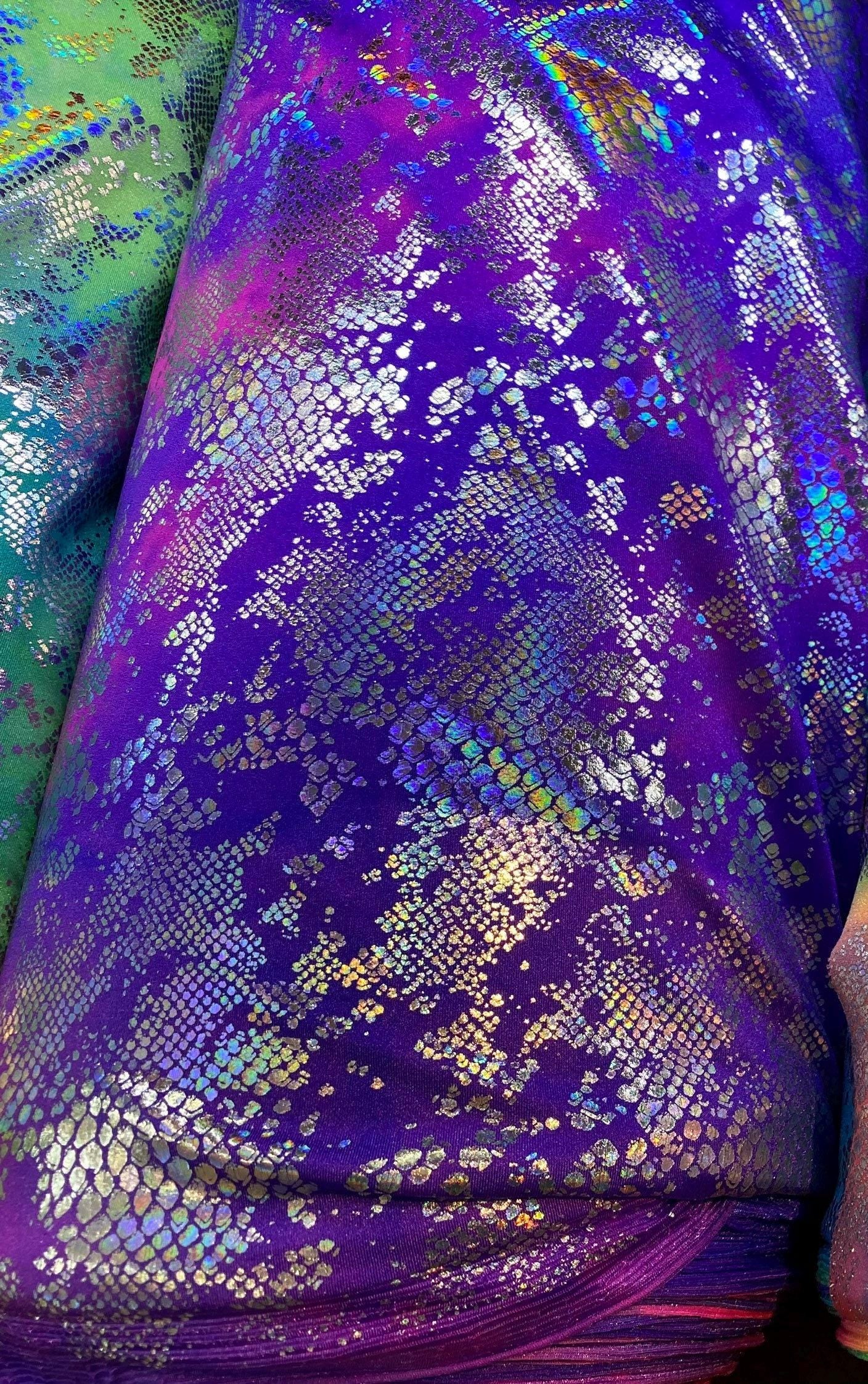 New tie dye Cobra design snake skin foil print on best quality of nylon spandex 4-way stretch 58/60” Sold by the YD. Ships Worldwide