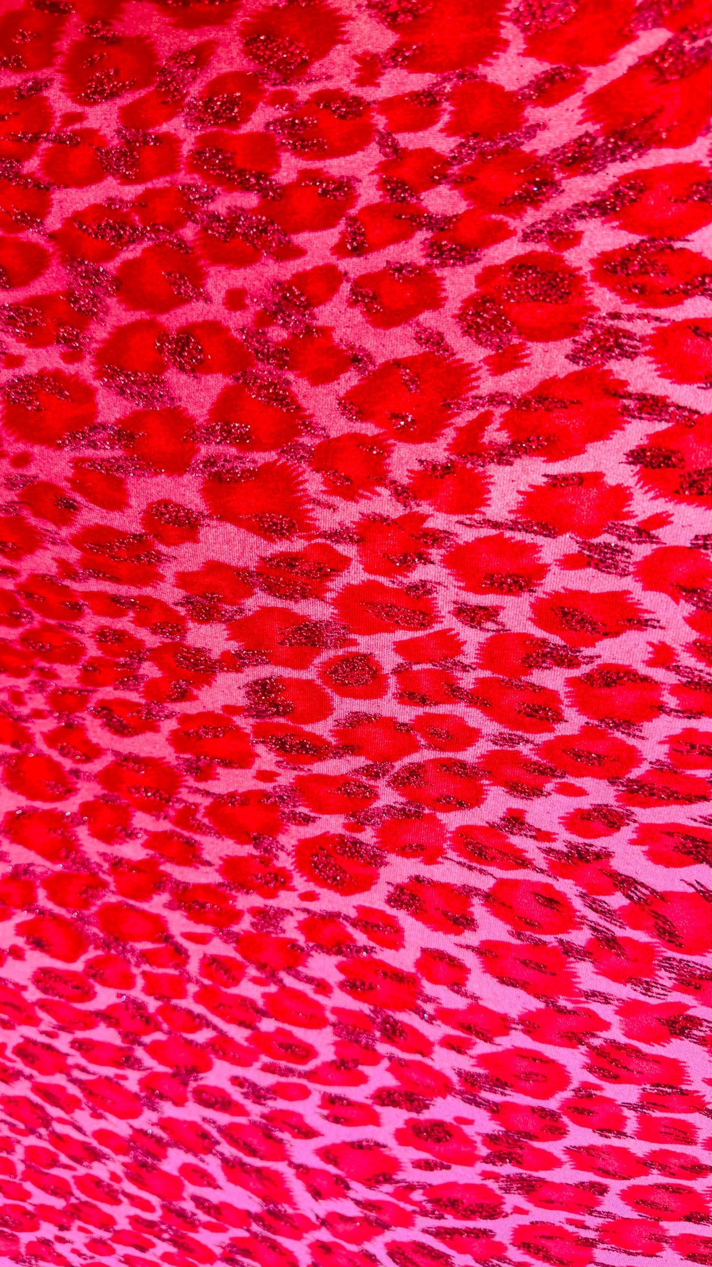 Leopard design Red/Pink with glitter print on velvet 420gsm 4way stretch 58/60” Sold by the YD. Ships worldwide from Los Angeles California