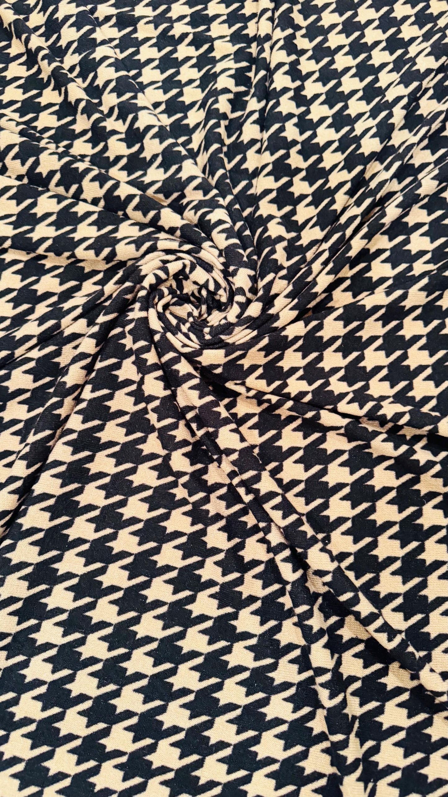 New Modern brand Houndstooth design print on sweater knit 2-way stretch 58/60” Sold by the YD. Ships worldwide from Los Angeles California