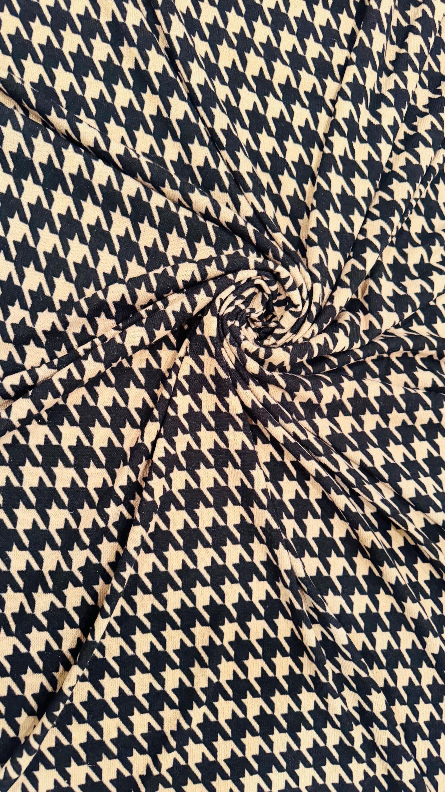 New Modern brand Houndstooth design print on sweater knit 2-way stretch 58/60” Sold by the YD. Ships worldwide from Los Angeles California