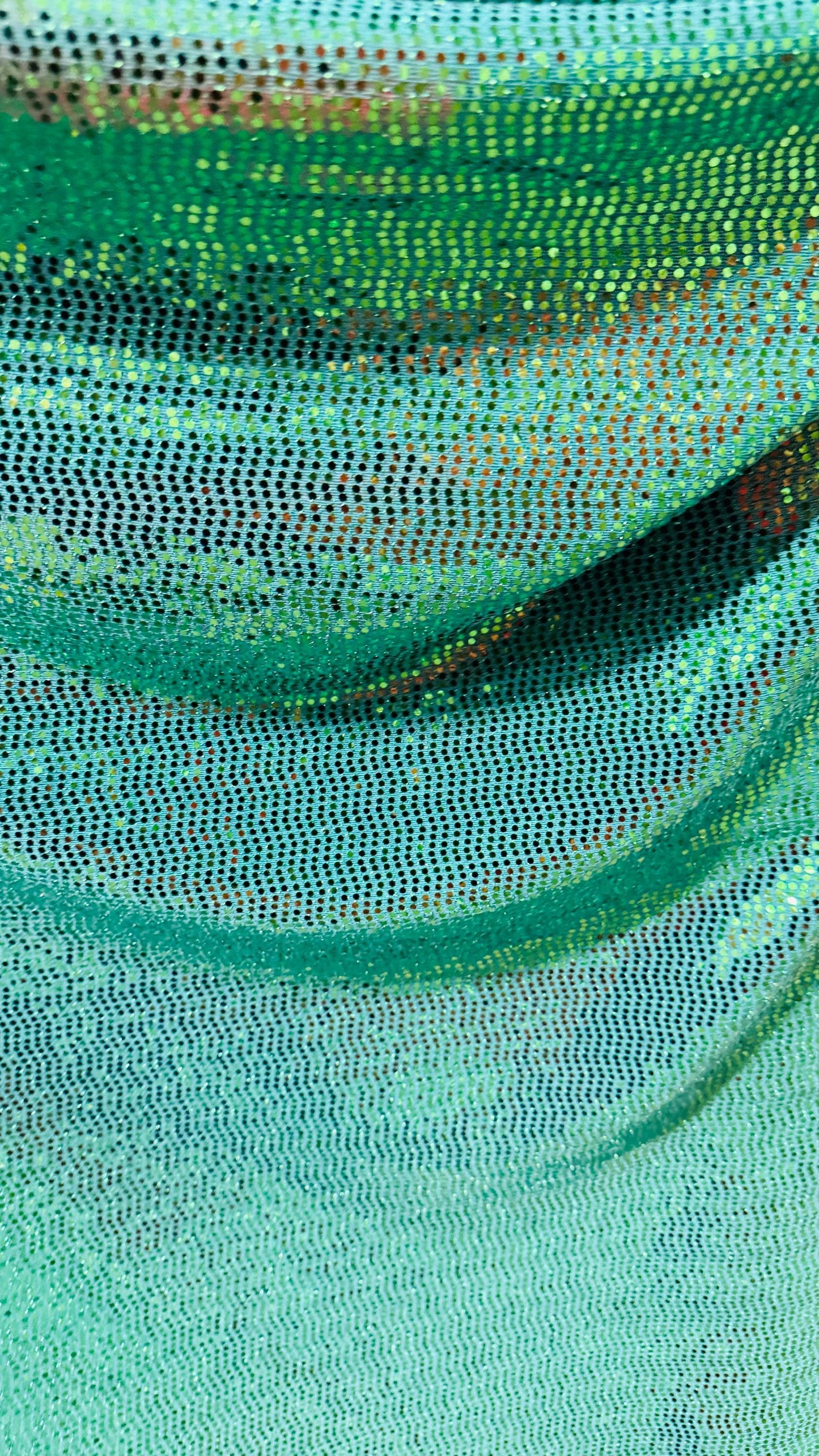 New mini hologram sequins on metallic stretch fabric 4-way stretch 58/60” Sold by the YD. Ships worldwide from Los Ángeles California USA.