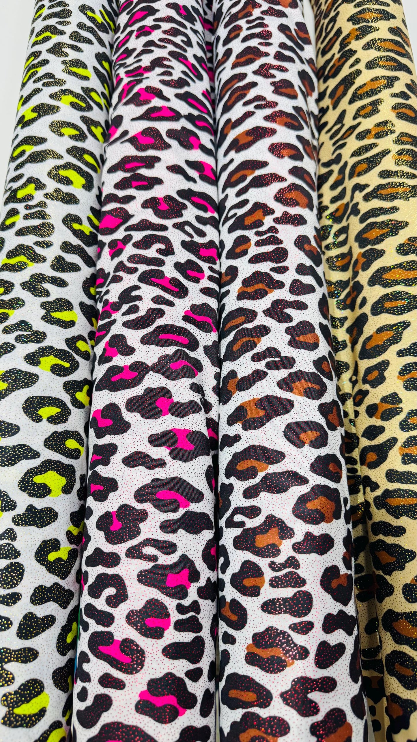 New Exotic Leopard design with hologram foggy foil 4way stretch nylon spandex 58/60" Sold by the YD. Ships worldwide from Los Angeles CA USA
